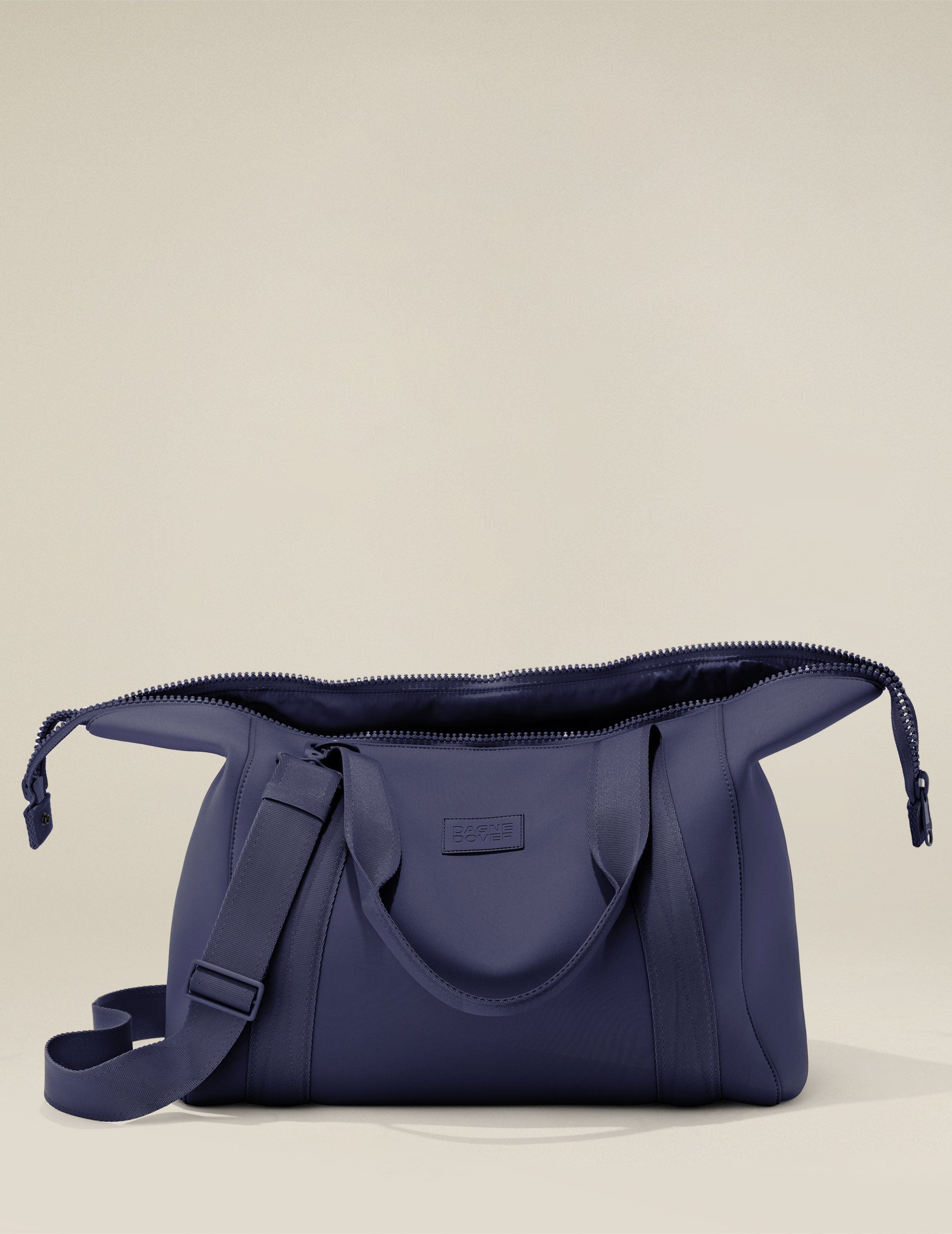 blue dagne dover large carryall bag. 