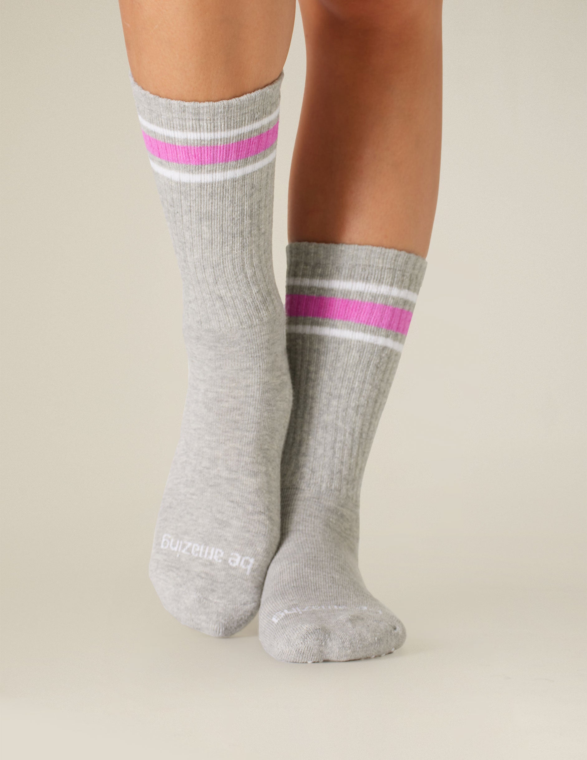 gray crew socks with pink stripe detailing. 