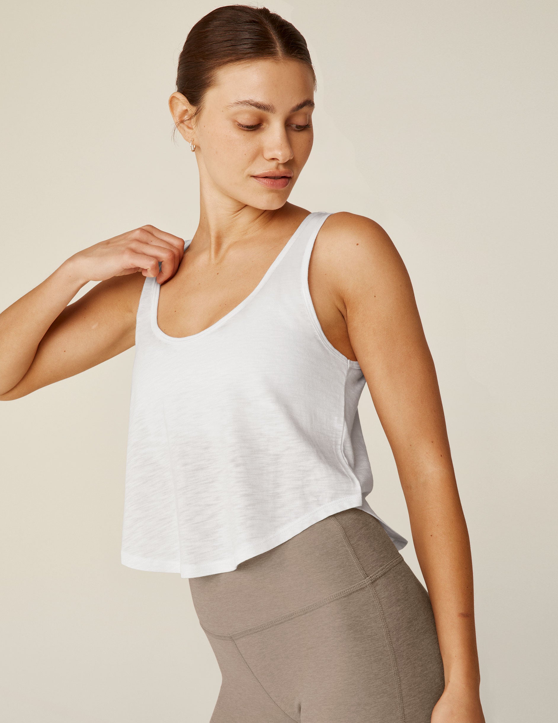 white scoop neck cropped tank top.