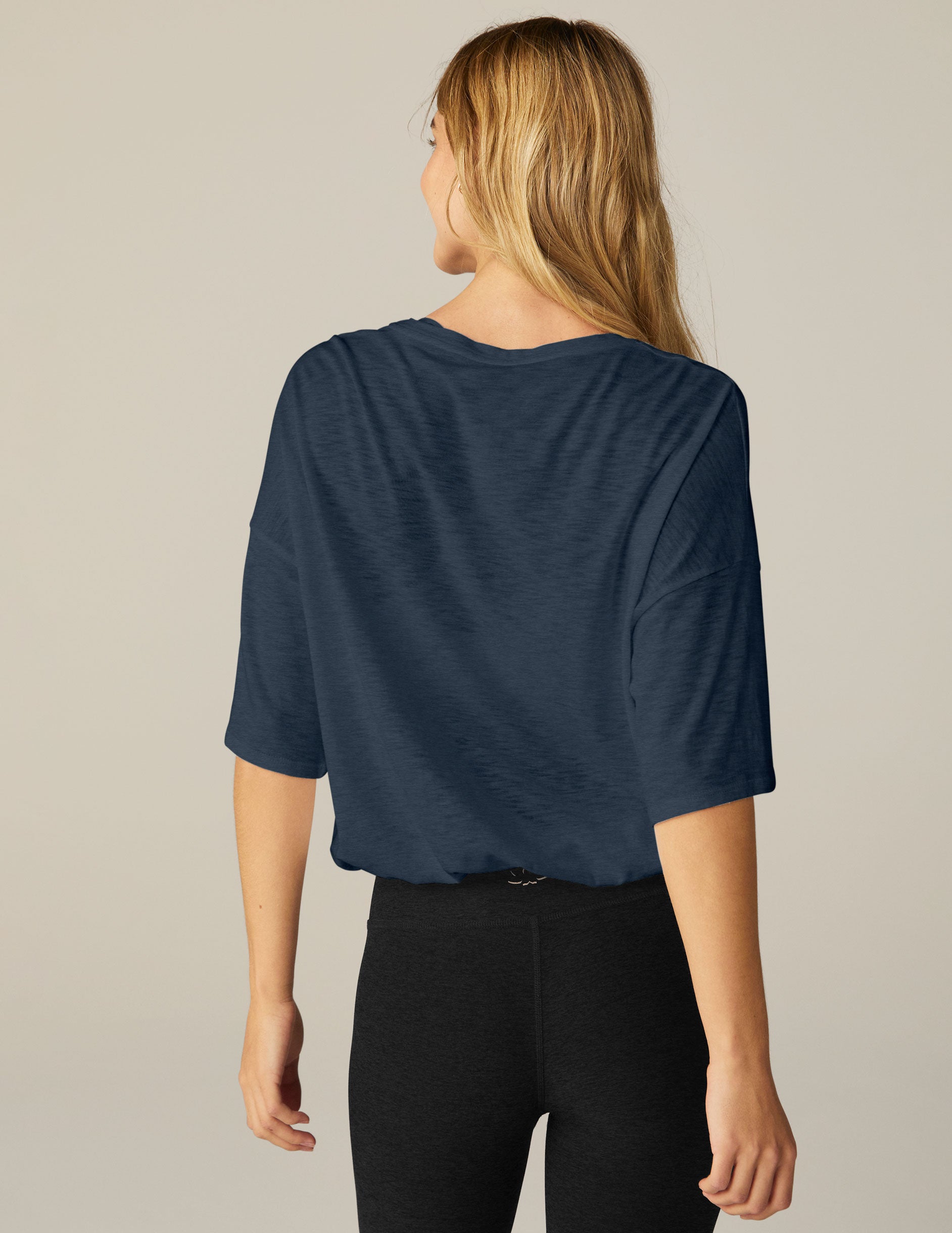 blue short sleeve top with tie detail