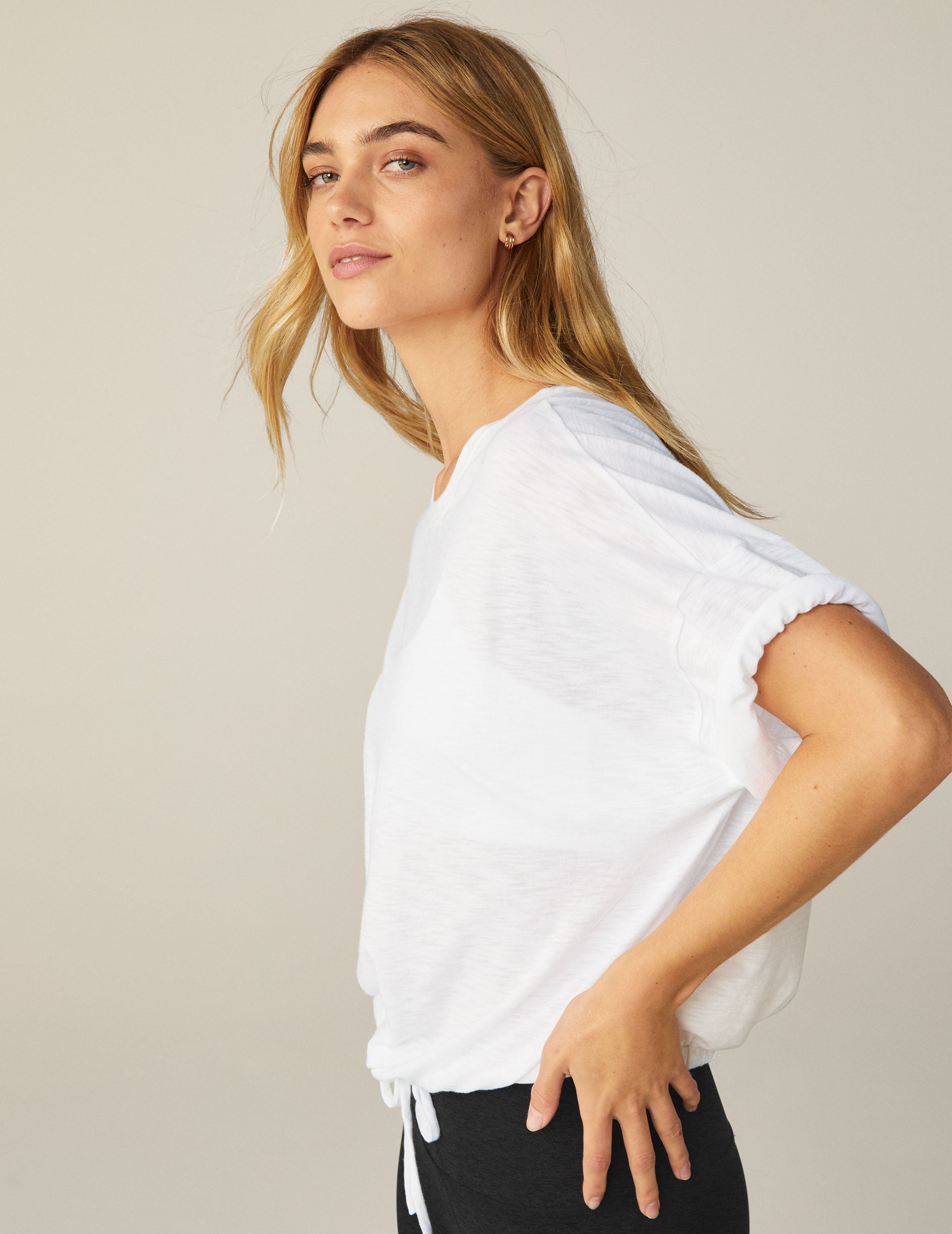 white short sleeve top with tie detail