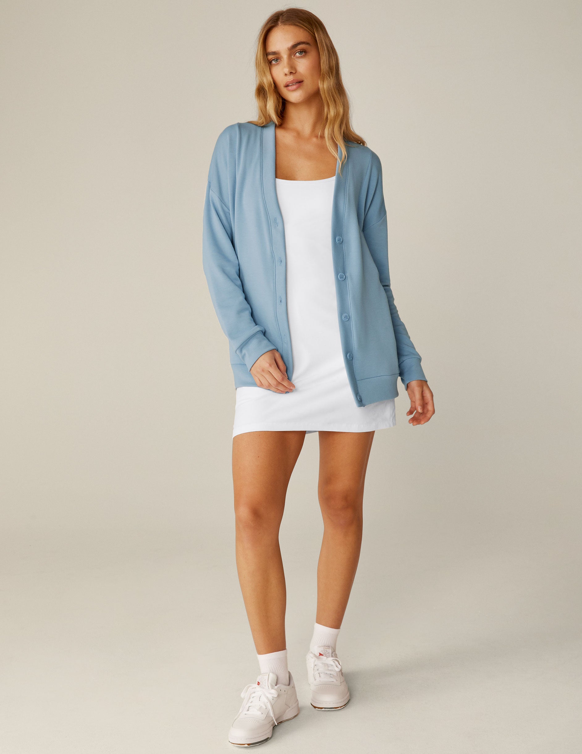 blue button up cardigan top. 
