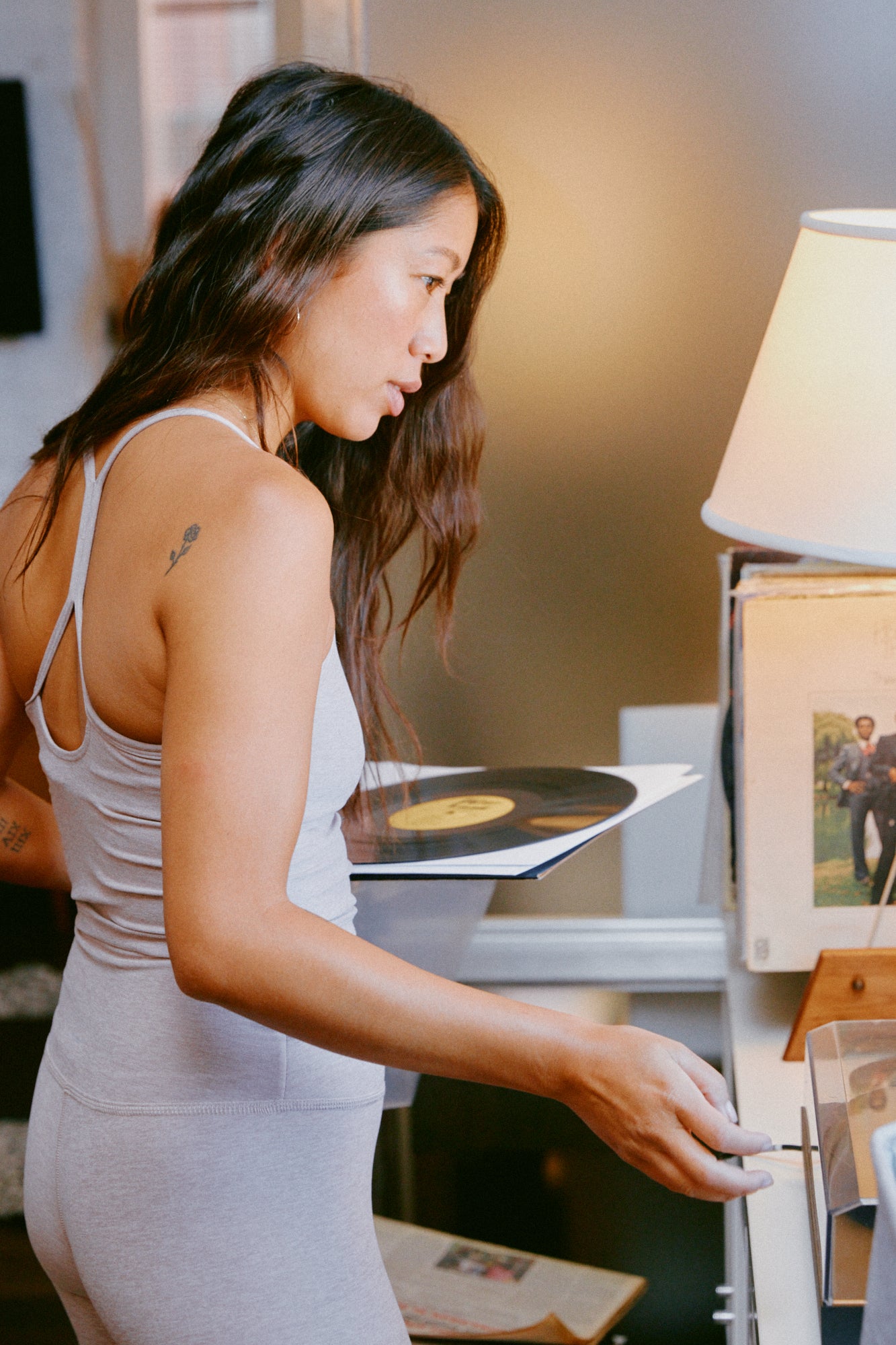 Claire holding record player in Chai Spacedye