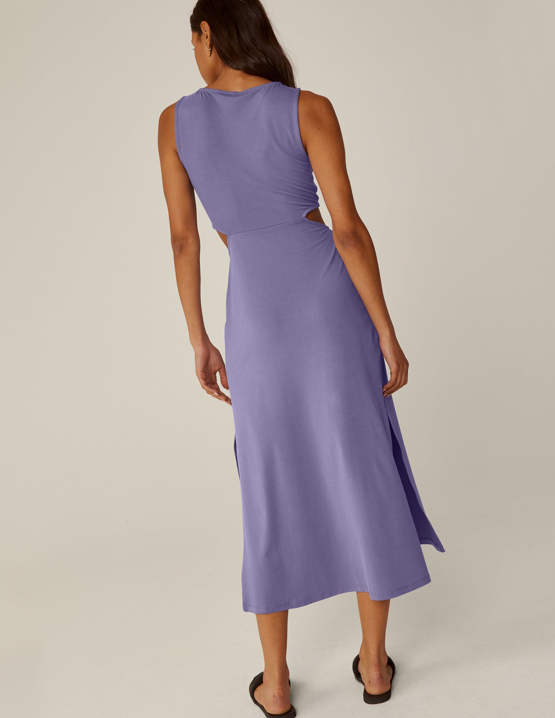 purple maxi dress with cutouts at the waist.