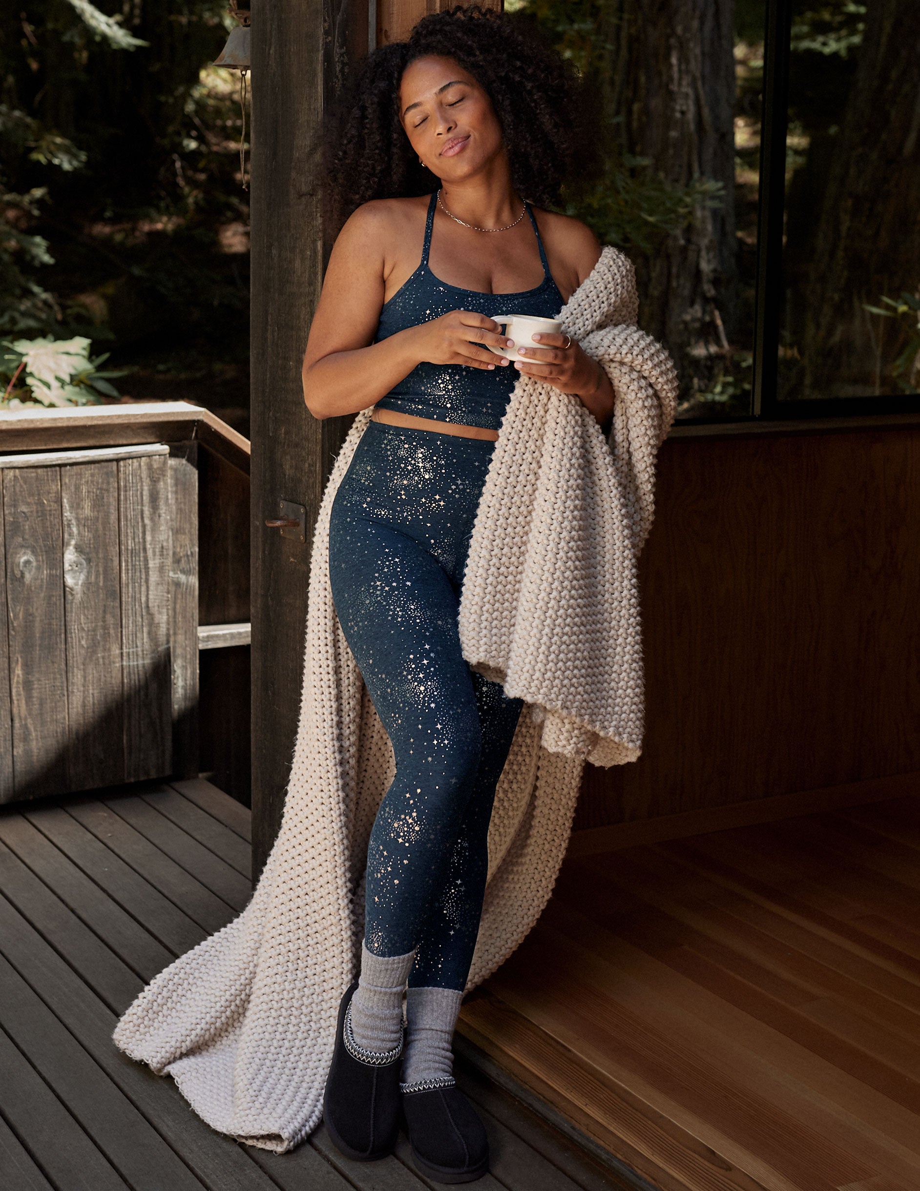 blue high-waisted midi leggings with a star foil print.