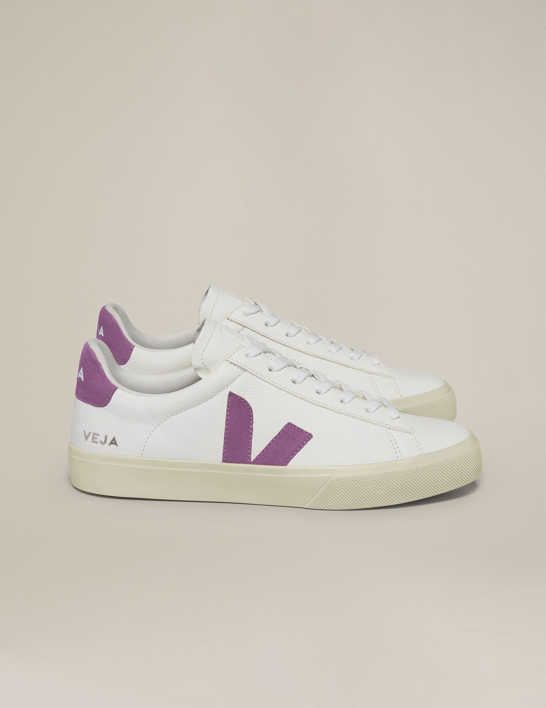 white and purple Veja sneakers.