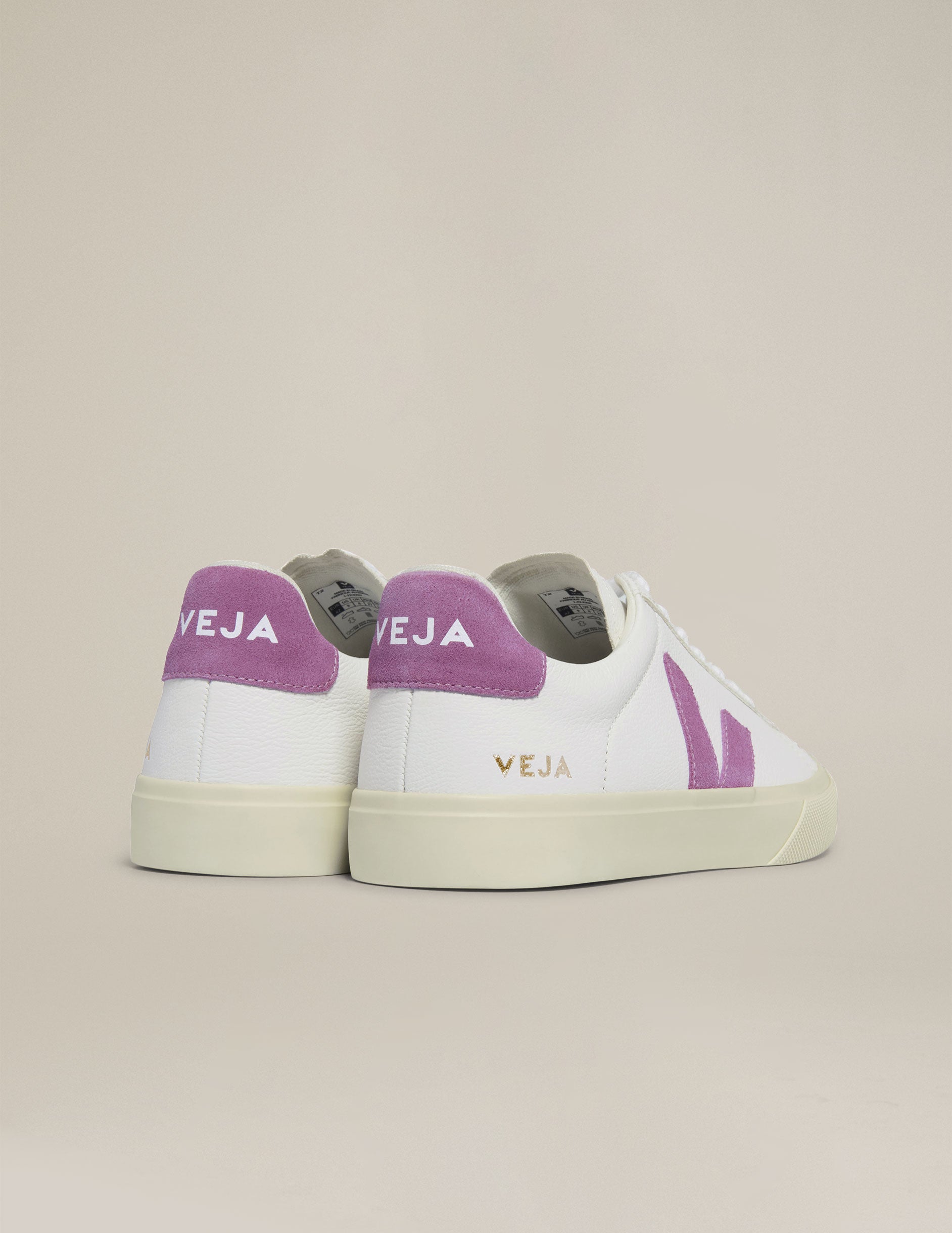 white and purple Veja sneakers.