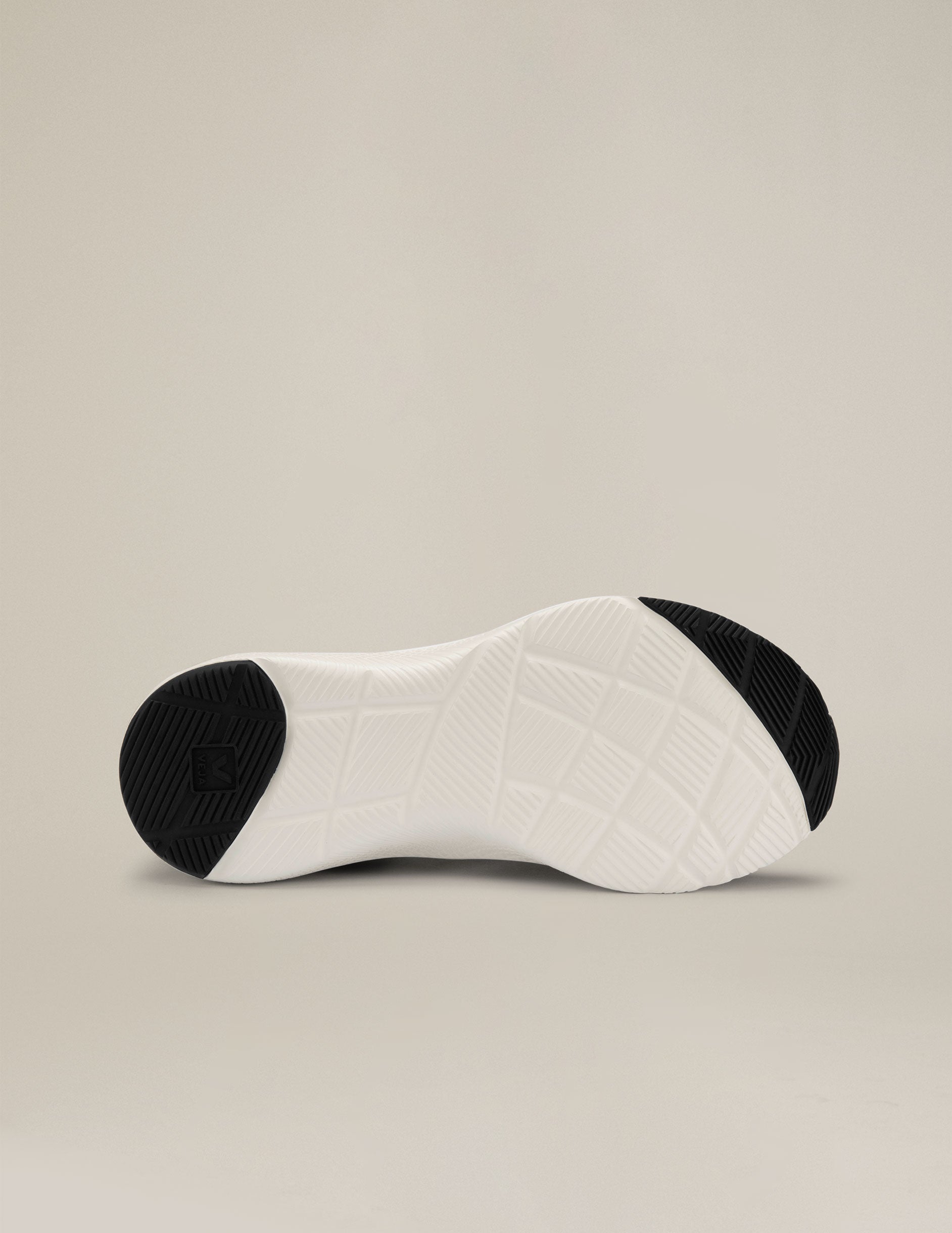 black and white Veja Impala running shoes. made in Brazil.