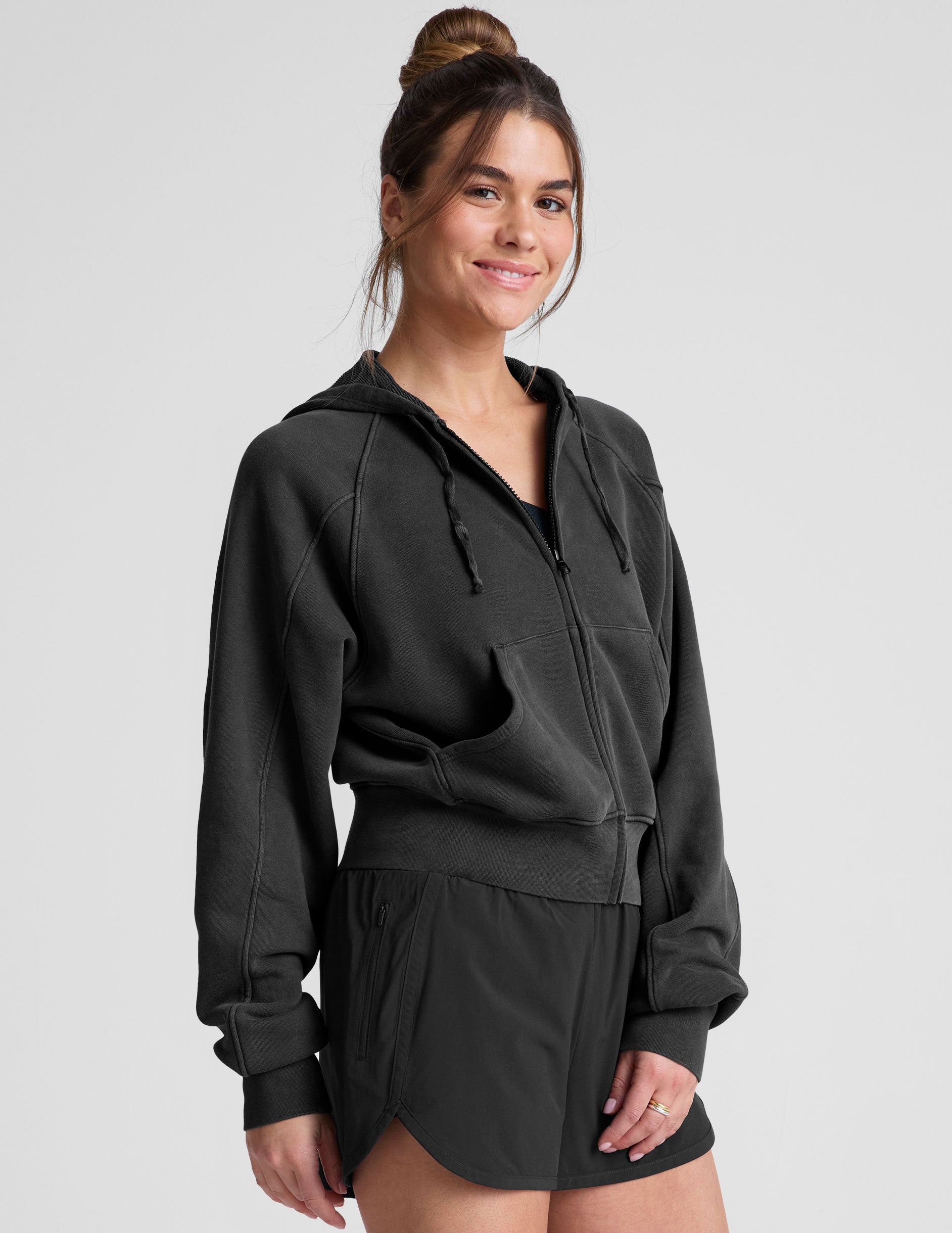black zip-up hoodie jacket with pockets.