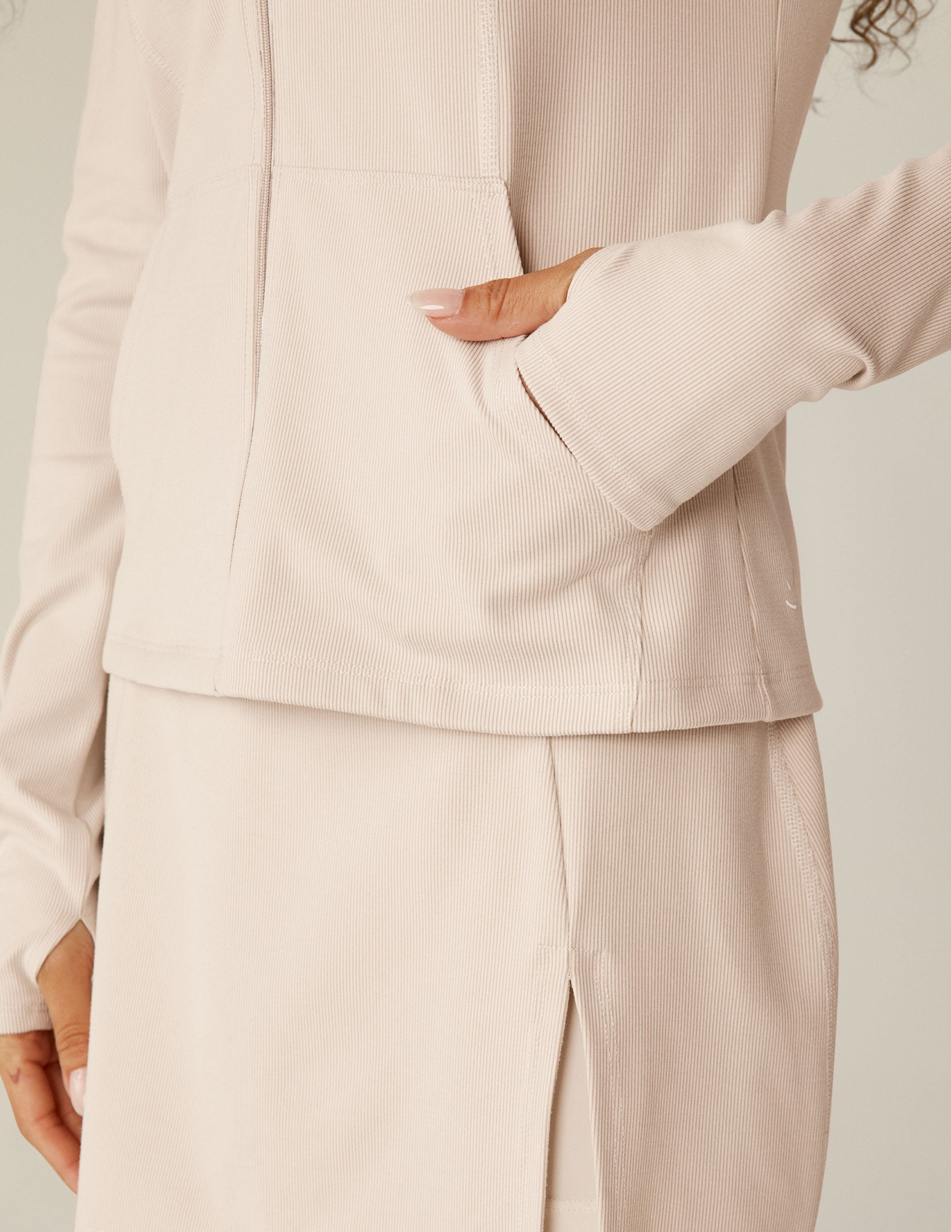 white heather rib zip-up hooded jacket with pockets. 