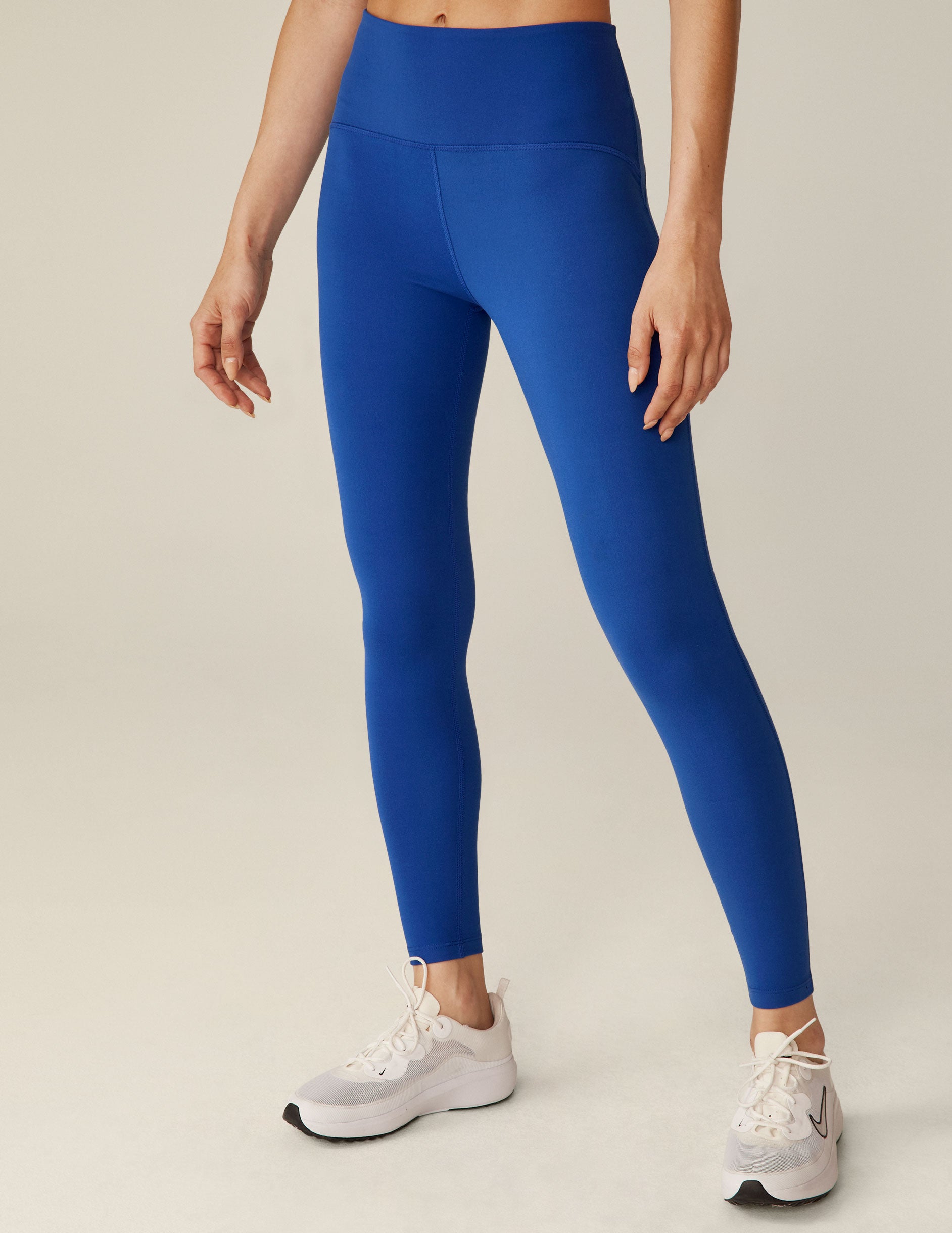 blue 4" waisted midi leggings. 