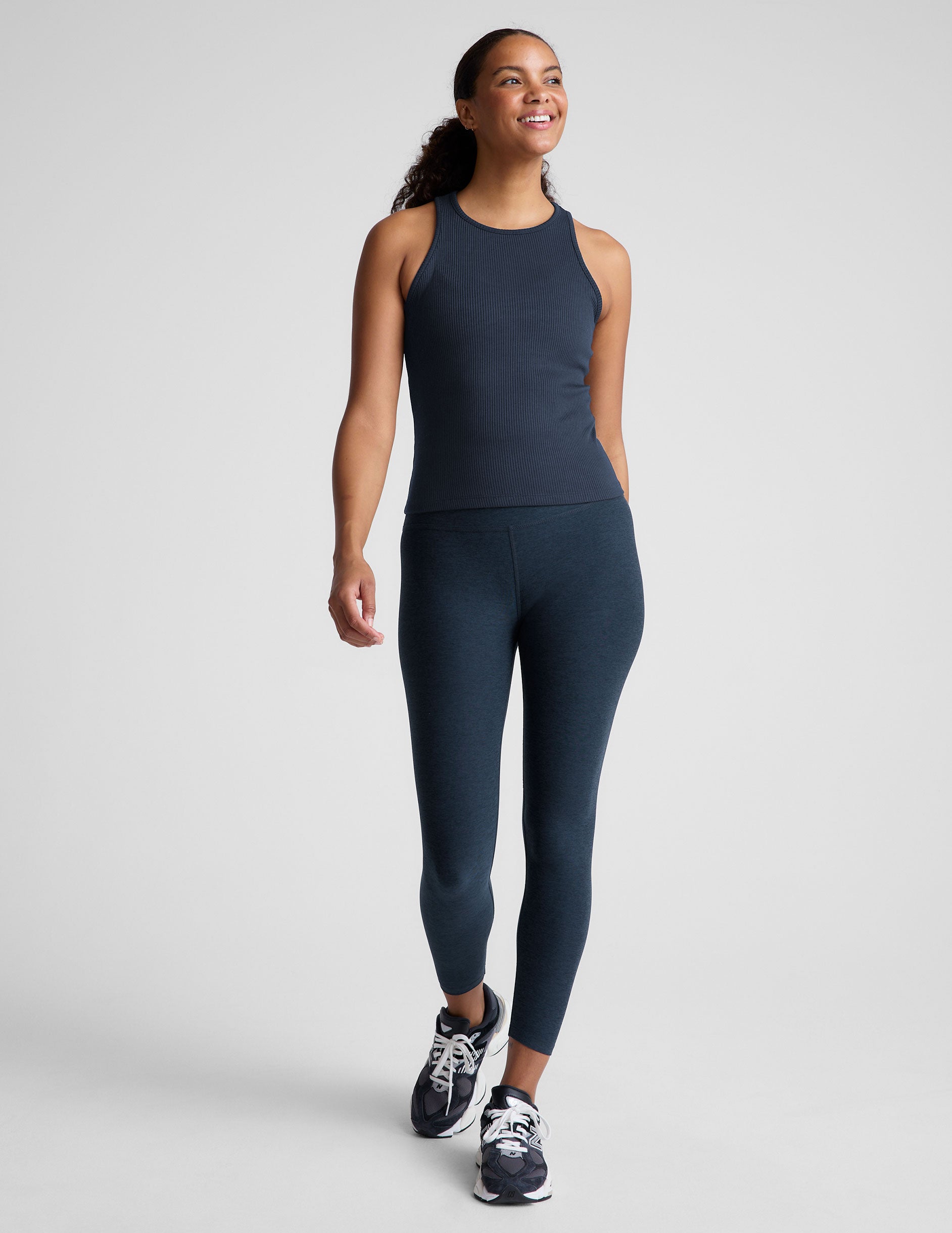 blue ribbed high scoop neckline midway length tank.