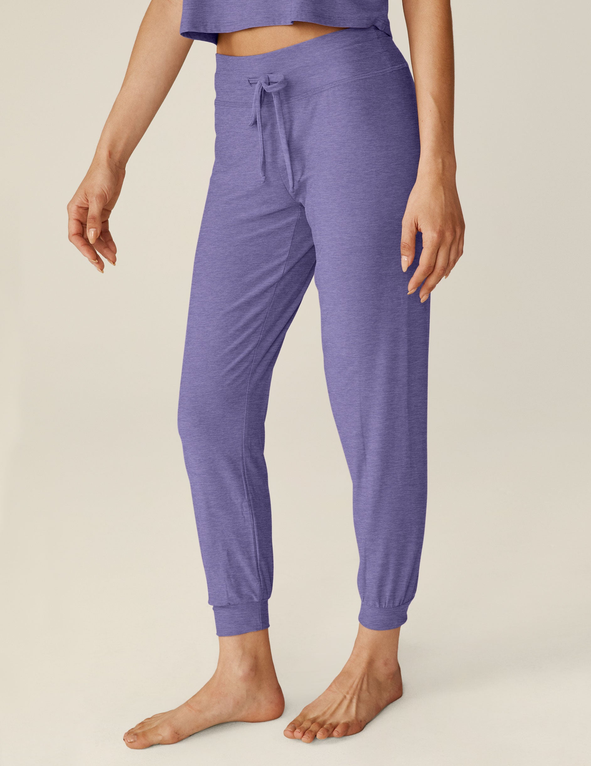 purple lounge sweatpants with a drawstring. 