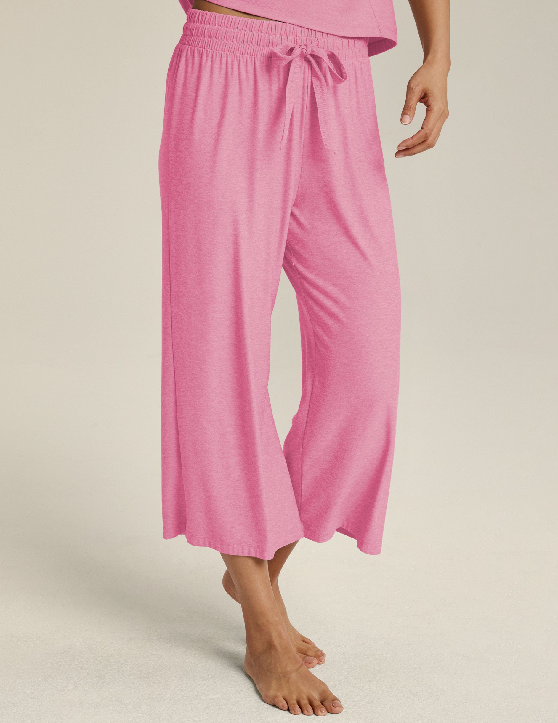 pink capri sleep pants with a ribbon drawstring at waist. 