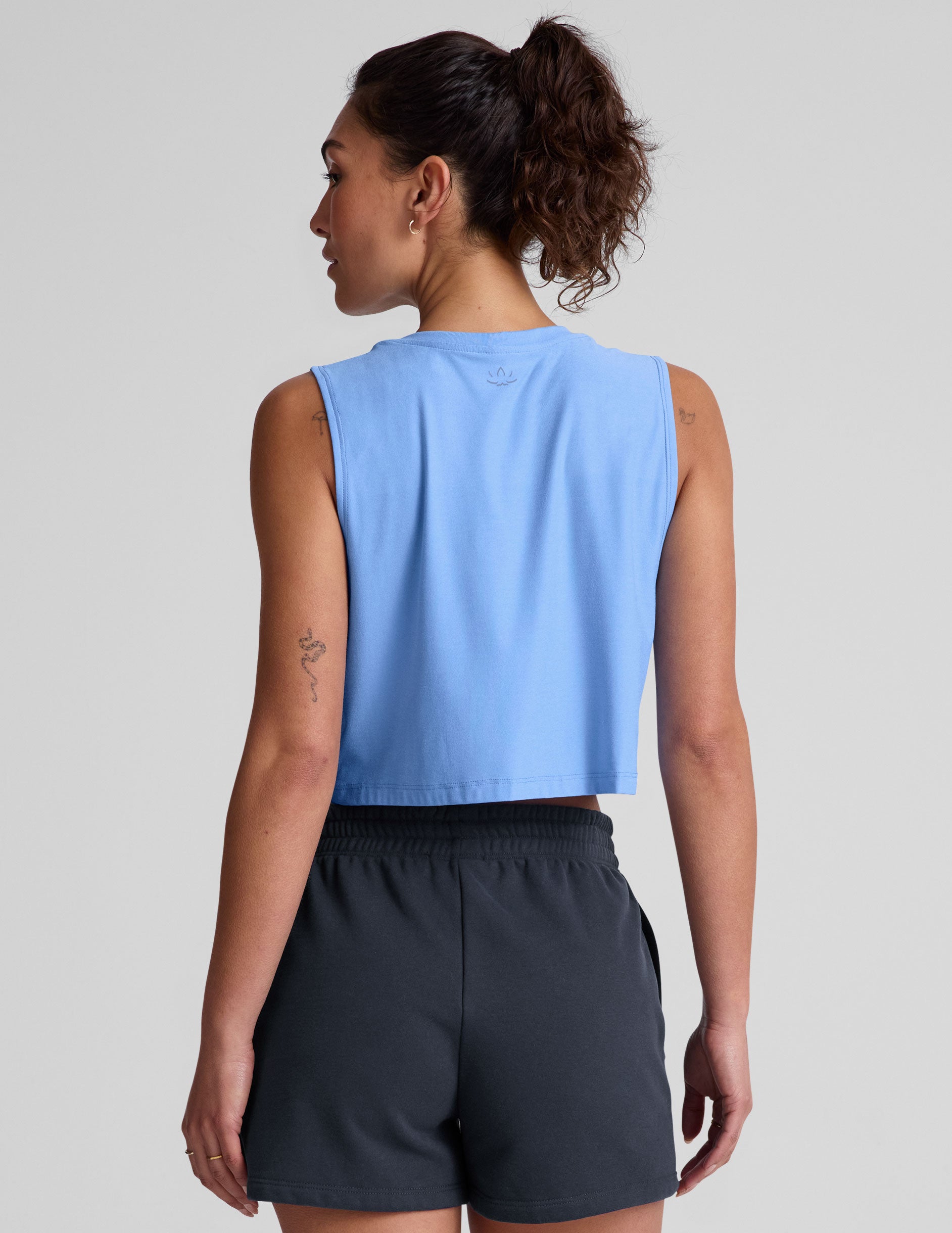 blue loose fitting cropped tank top.