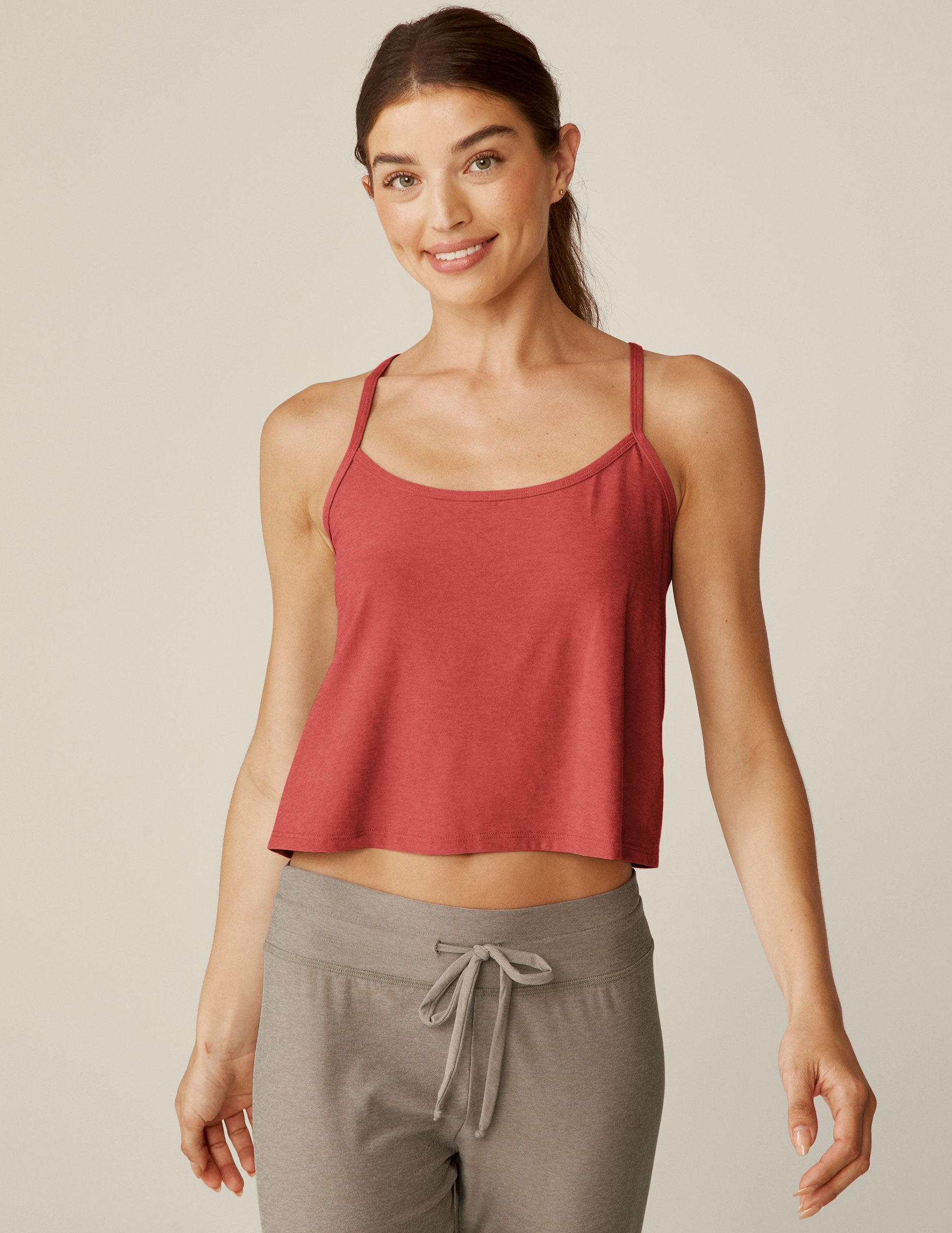 red sleep tank with criss cross strap design in back