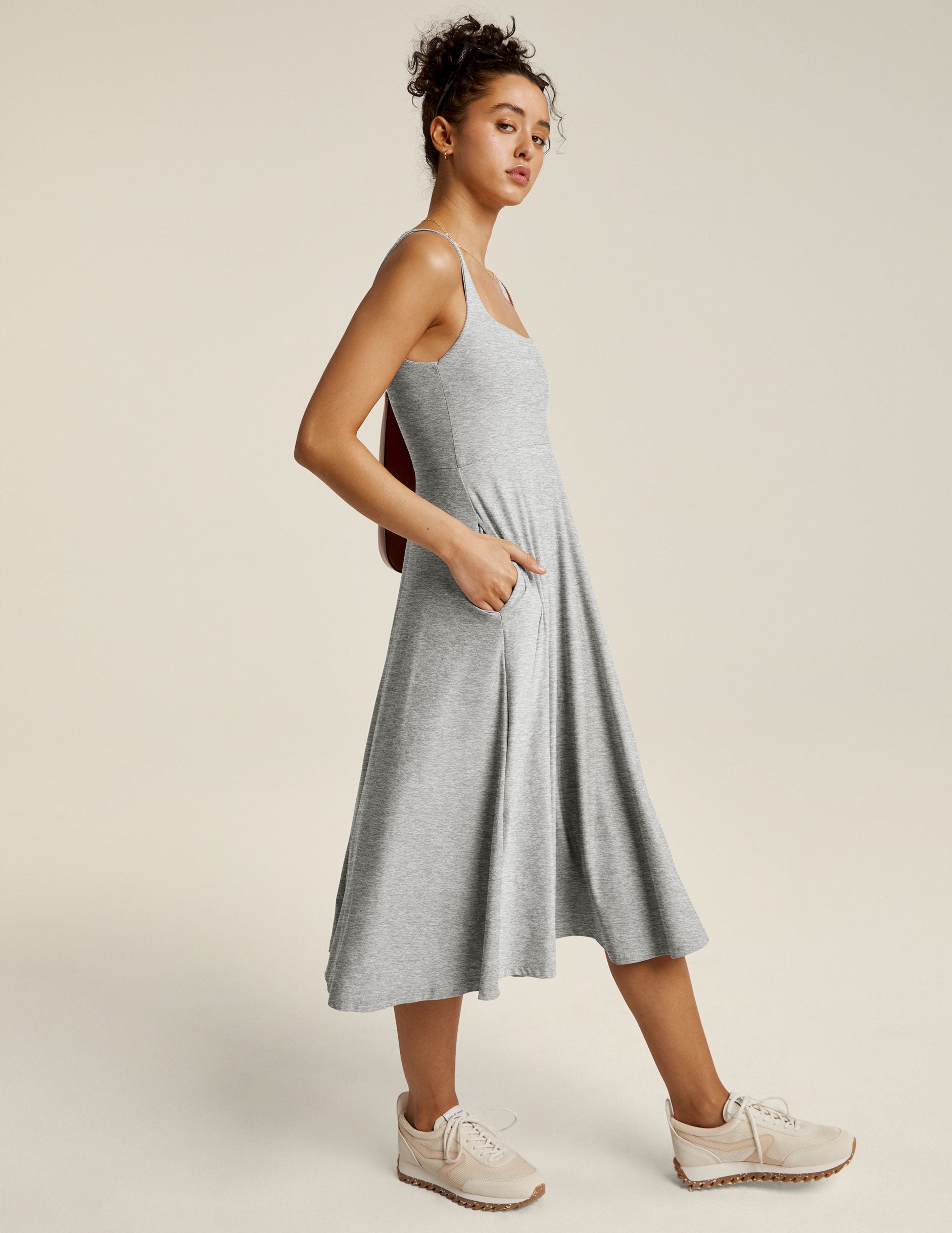 light gray sleeveless midi loose fitting dress with square neckline and pockets