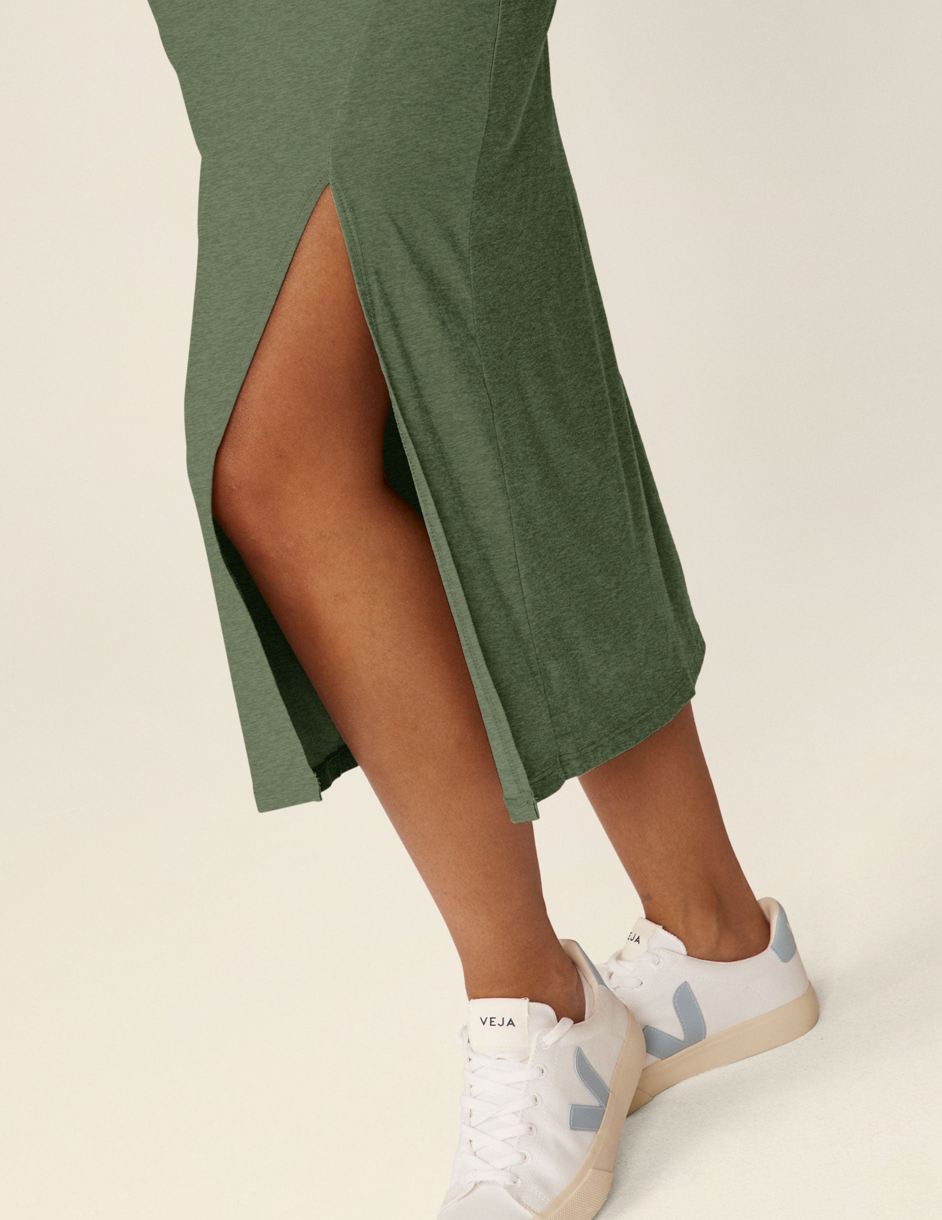 green square neck midi length dress with a front side slit.
