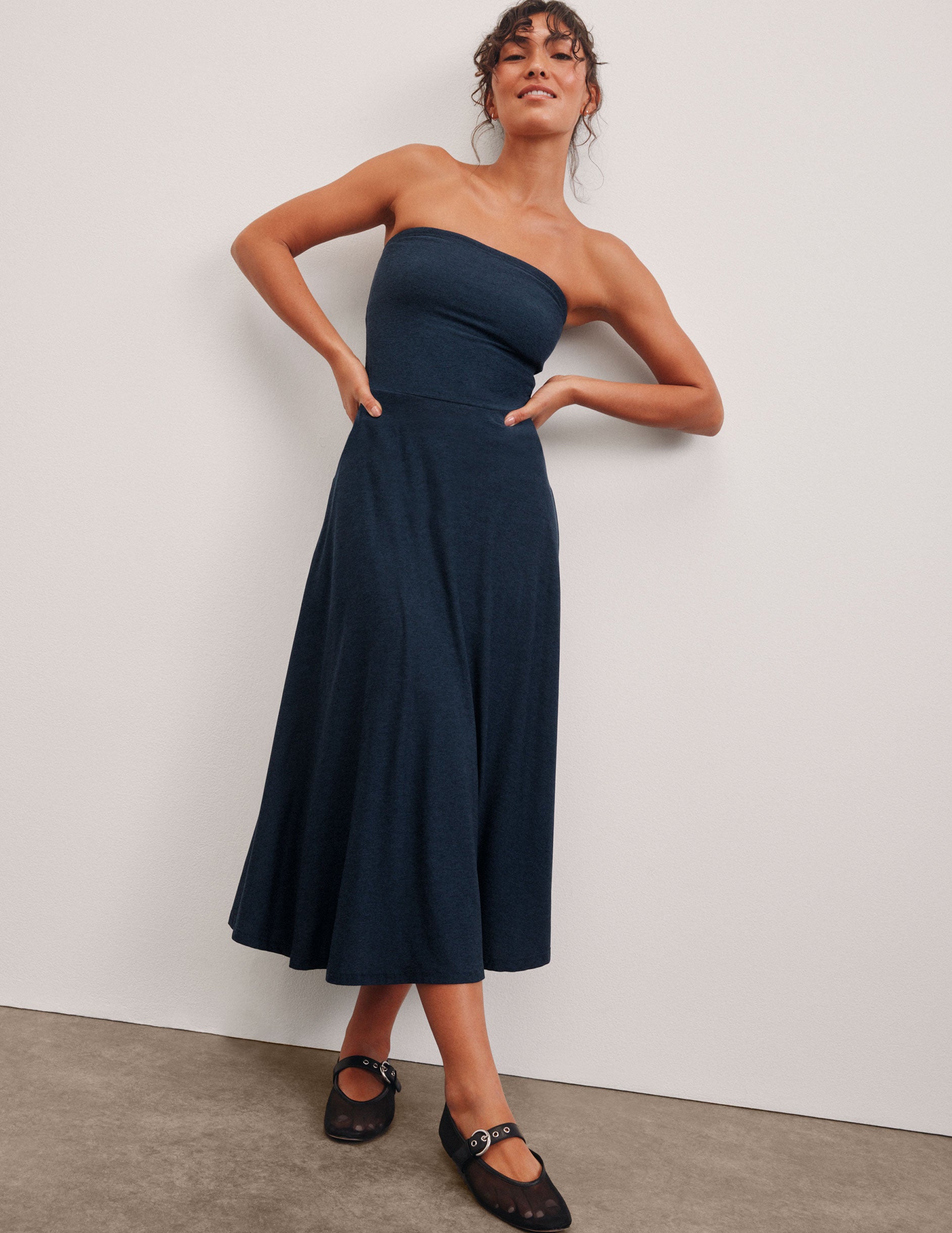 blue strapless midi dress with pockets.