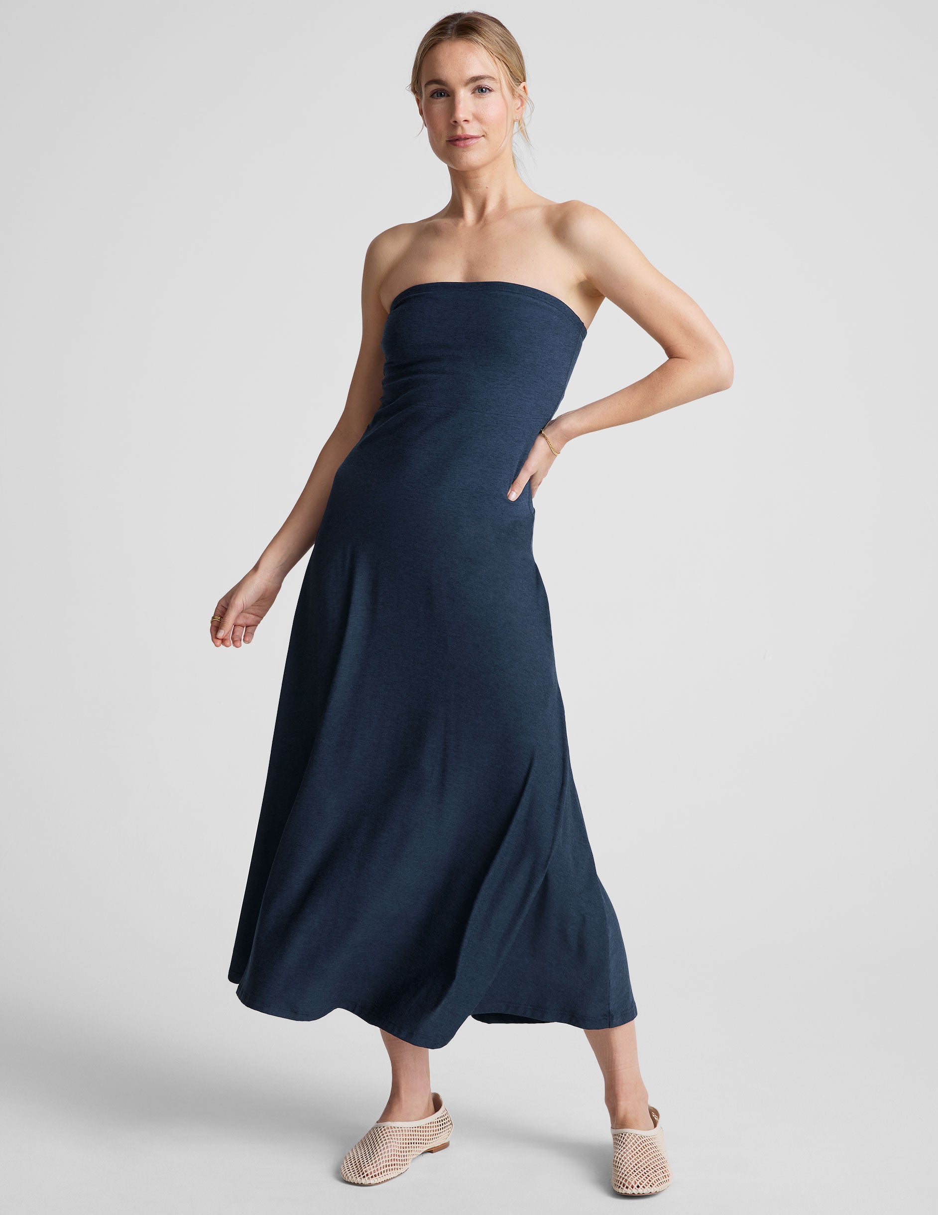 blue strapless midi dress with pockets.