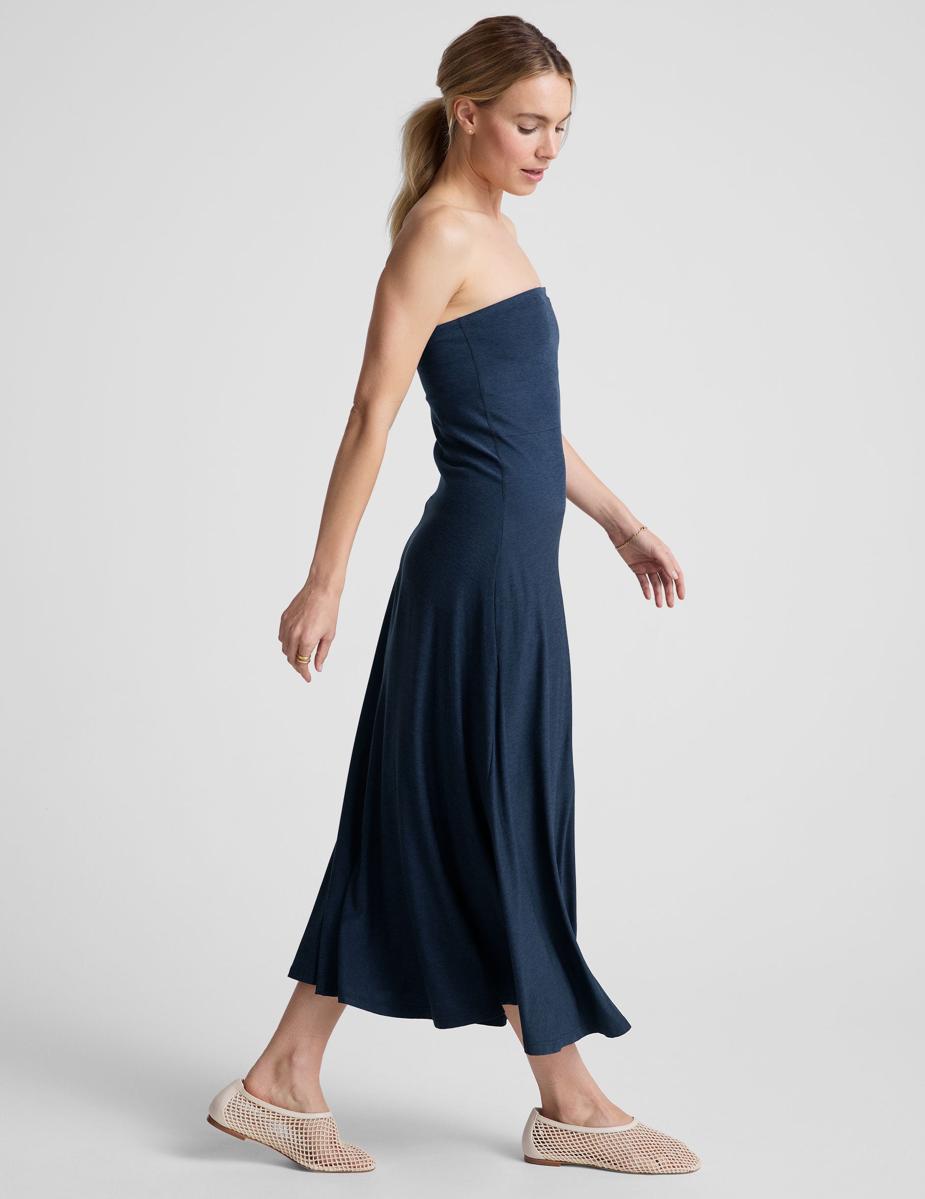 blue strapless midi dress with pockets.