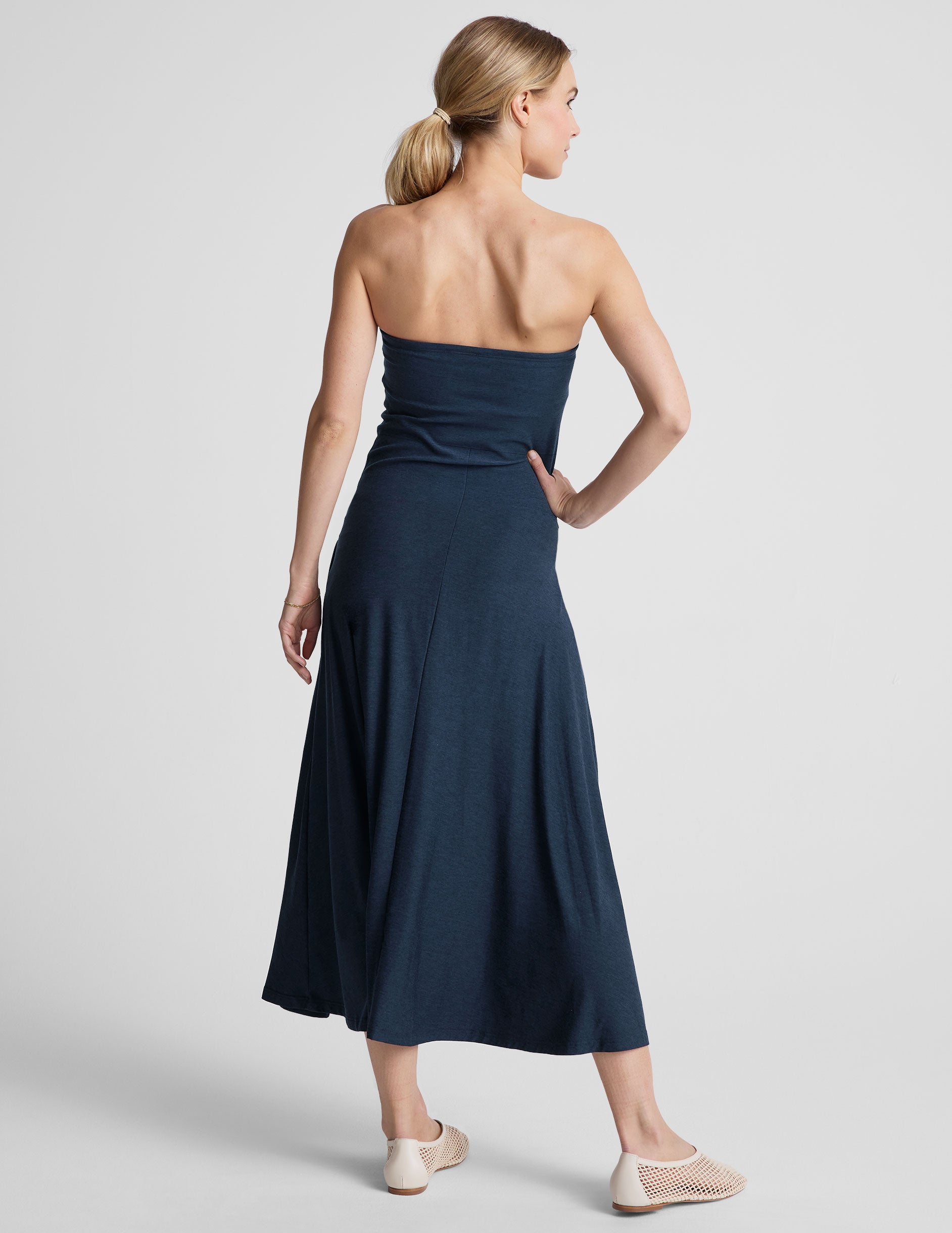 blue strapless midi dress with pockets.
