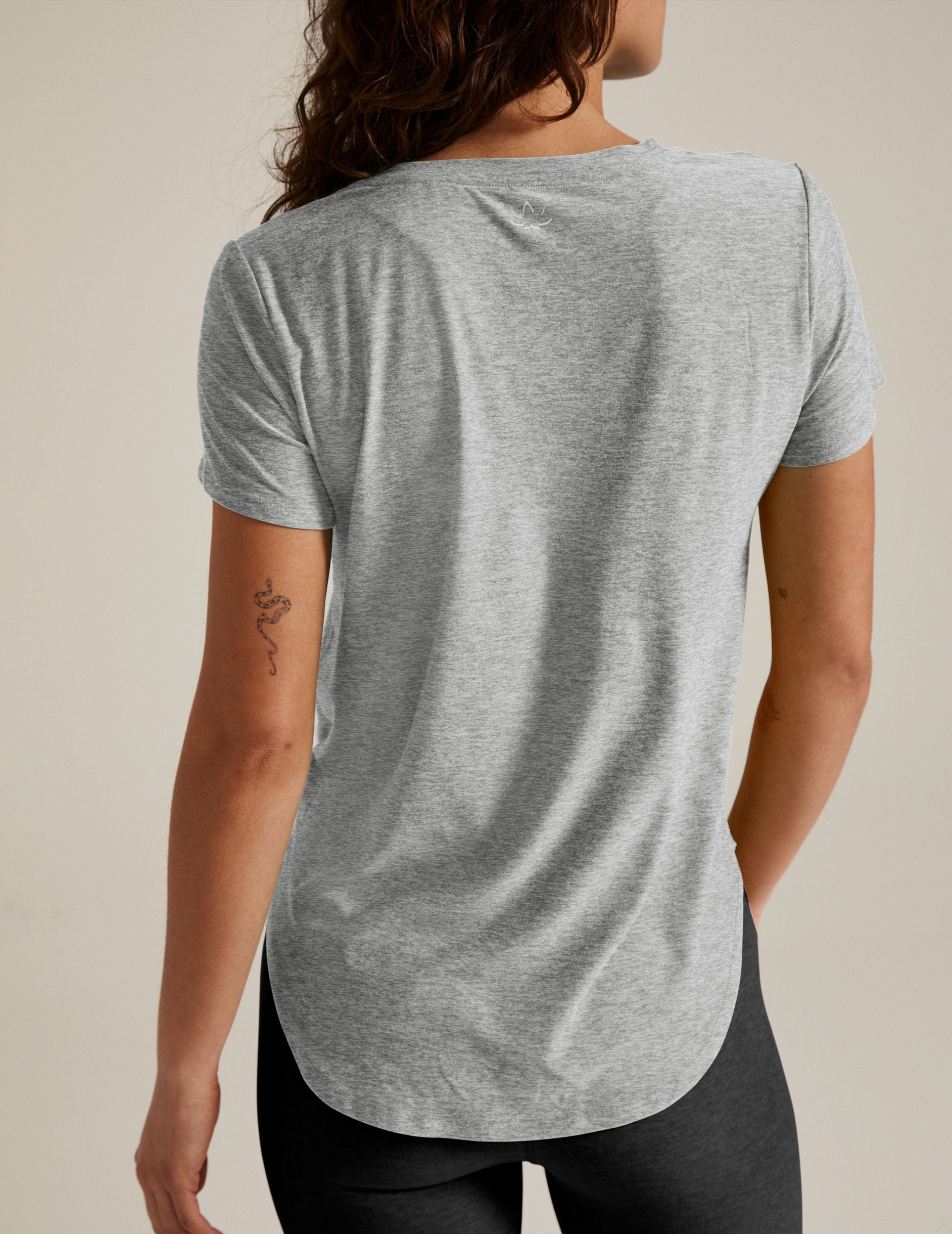 silver short sleeve t-shirt. 