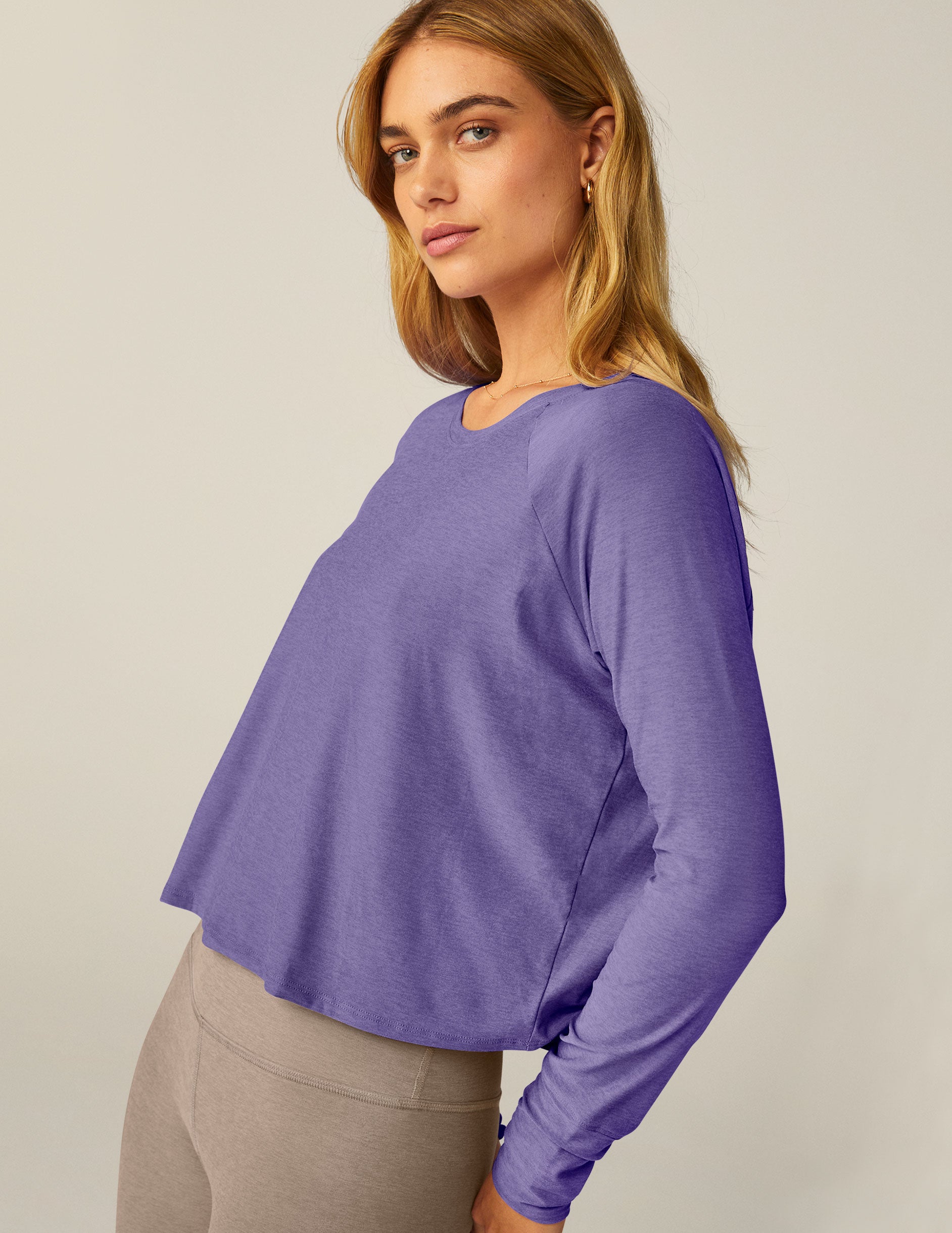 purple long sleeve crew neck top. 