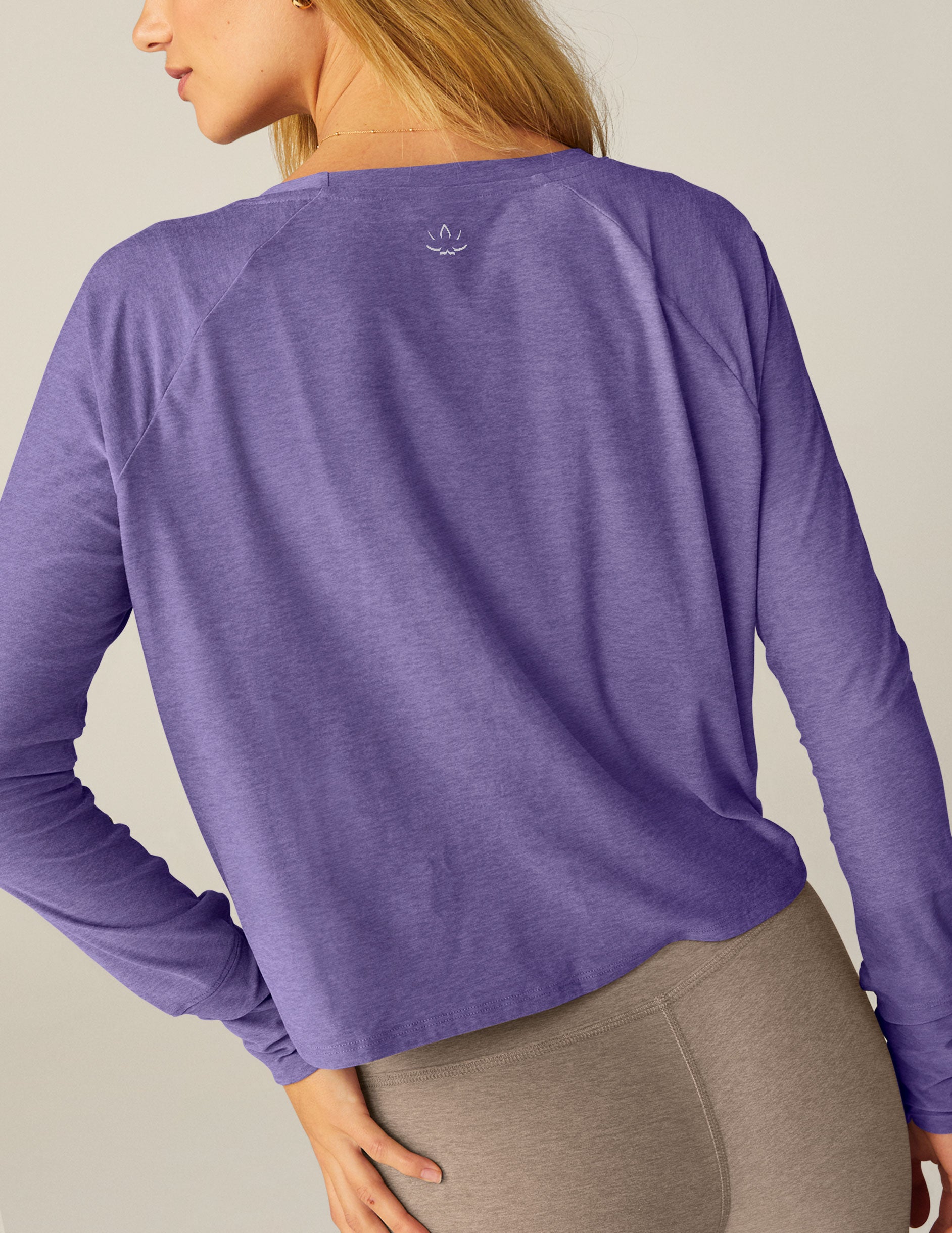 purple long sleeve crew neck top. 