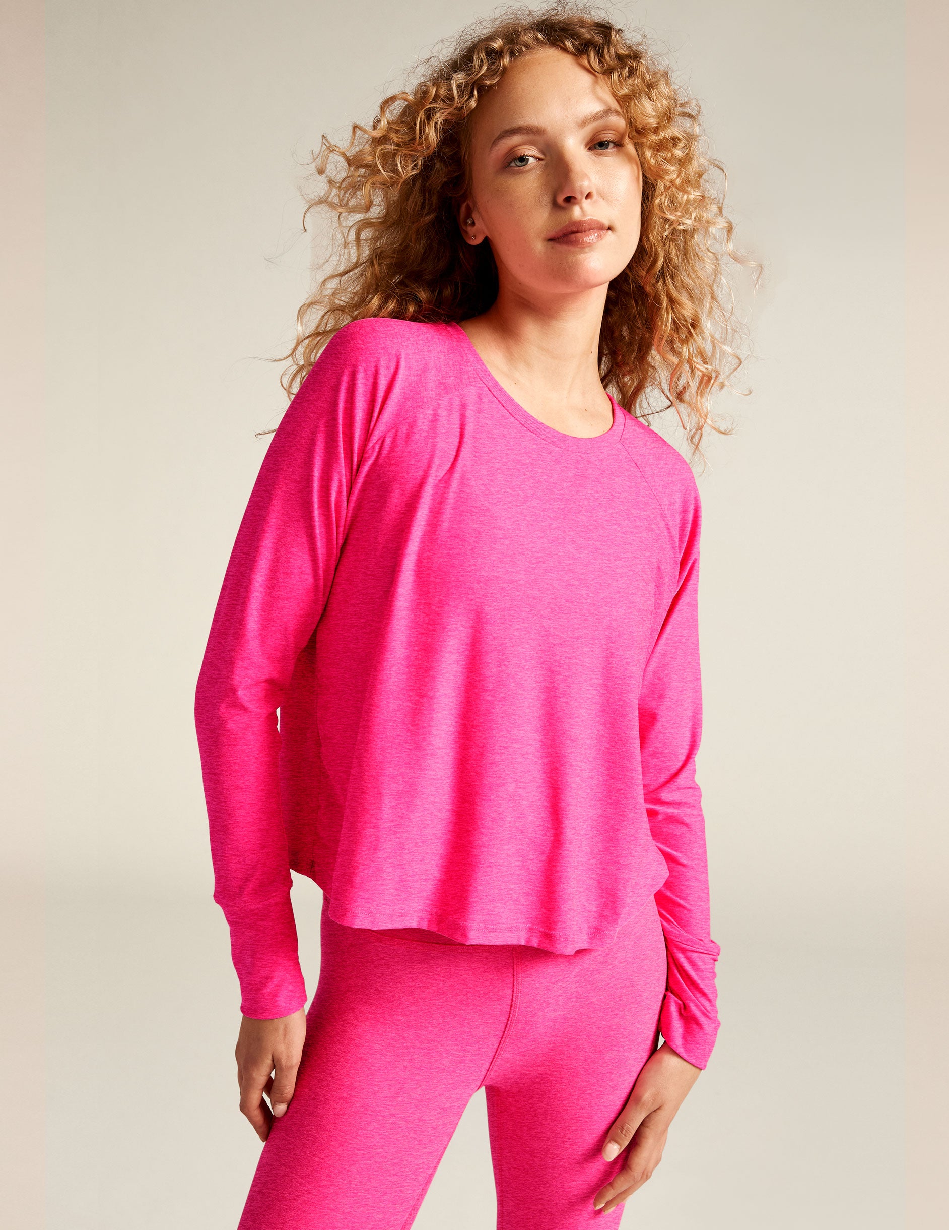 pink long sleeve pullover top. 