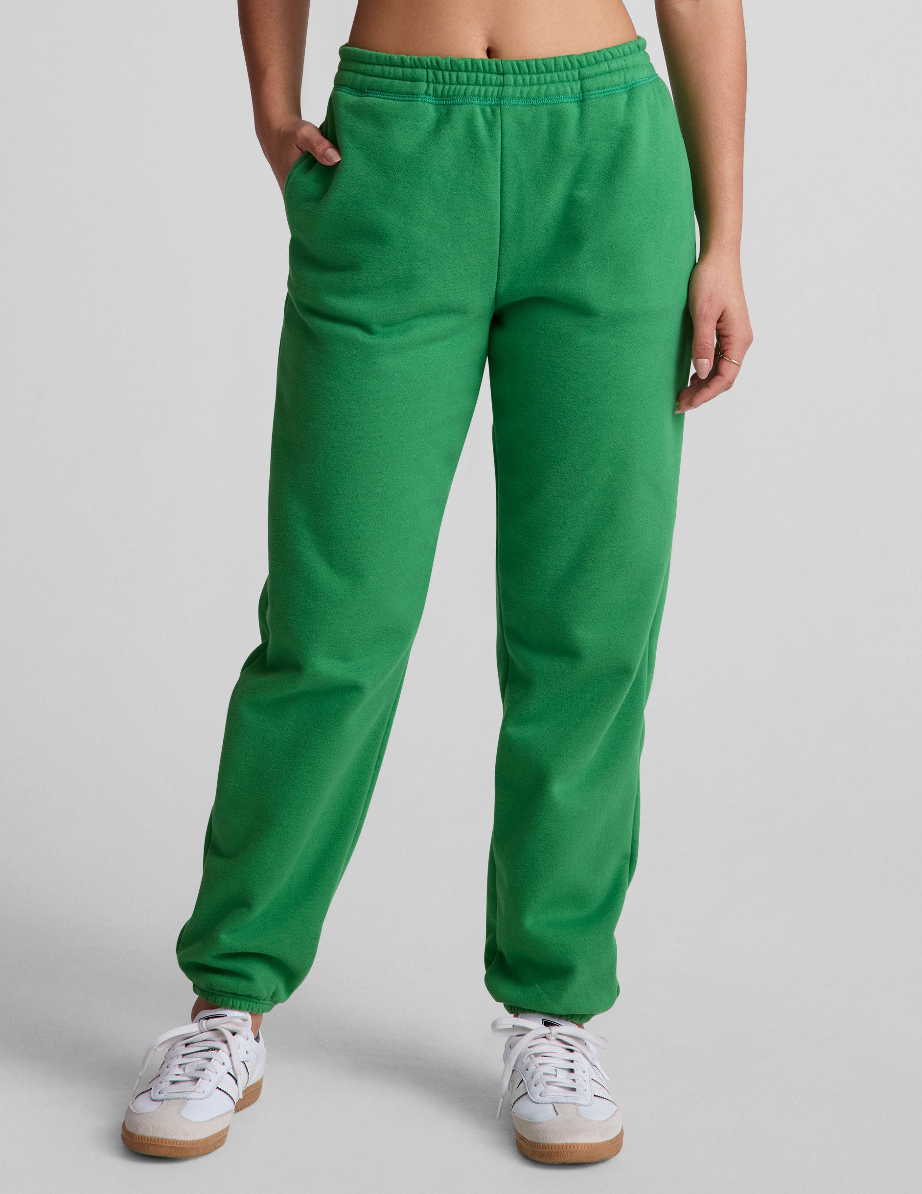 green midi length joggers with pockets.