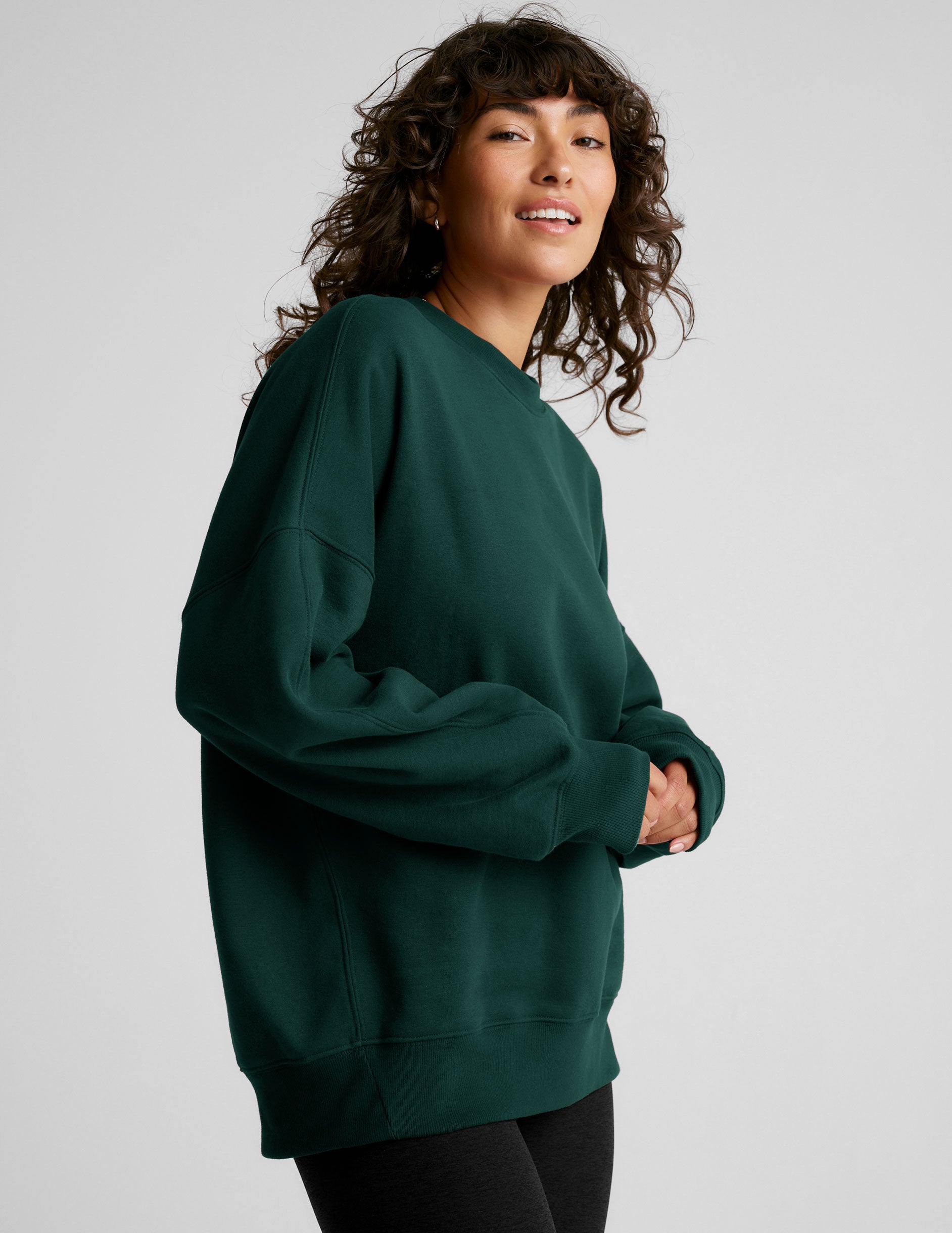 green crew neck oversized sweatshirt.