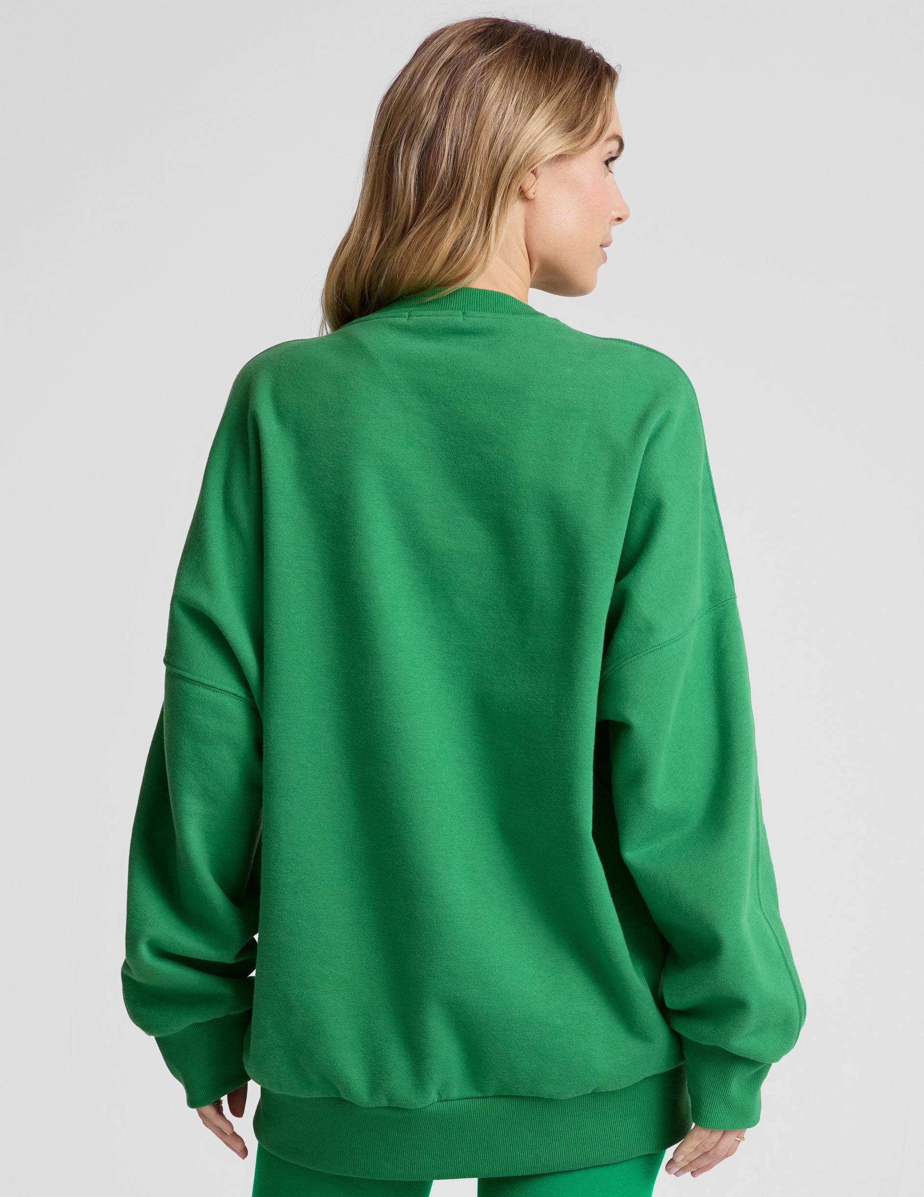 green crewneck oversized sweatshirt.