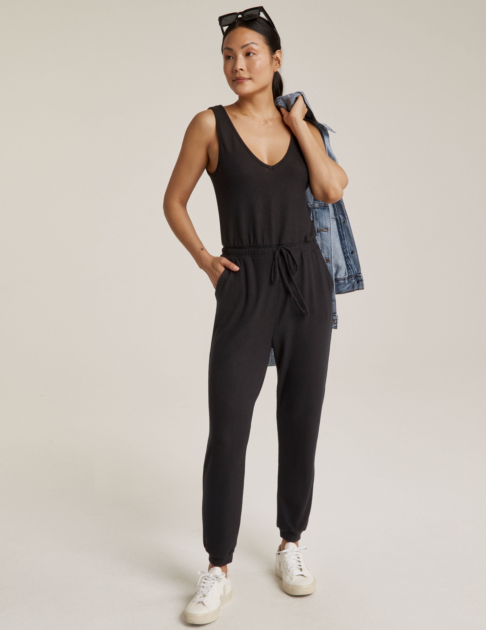 black jumpsuit with drawstring at waist