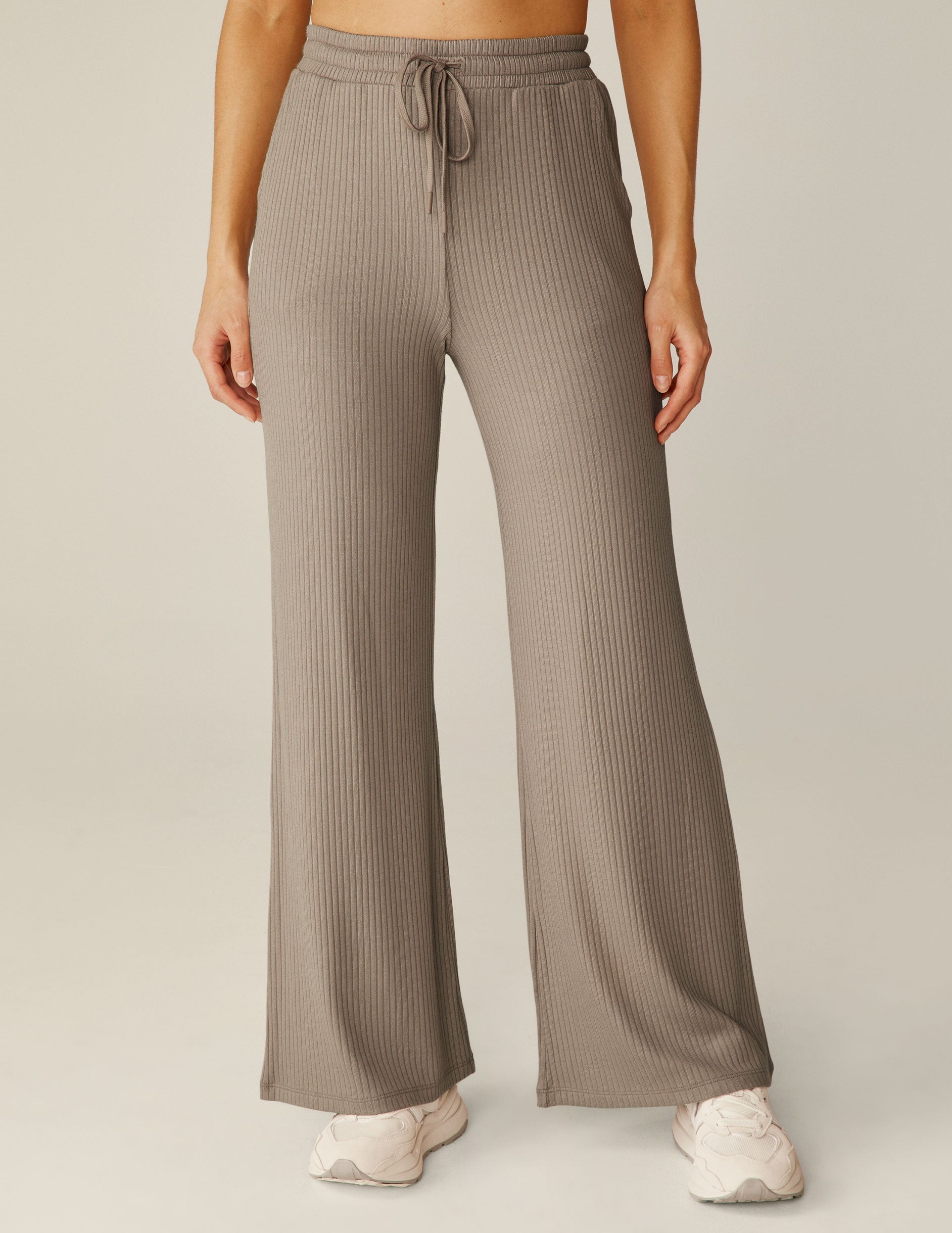 brown high-rise ribbed wide leg pants with a drawstring. 