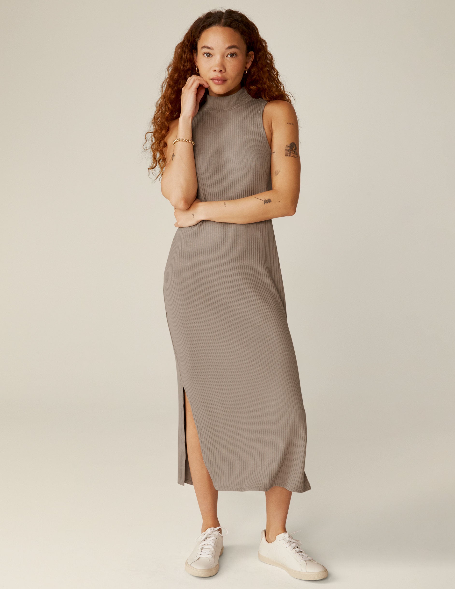 brown mock neck ribbed midi dress with a front side slit. 