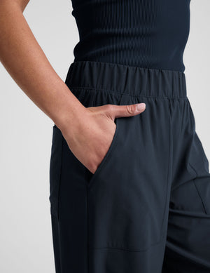 blue mid-rise wide leg pant with pockets.