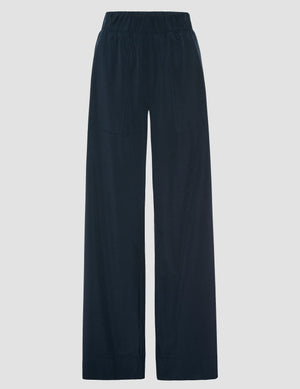 blue mid-rise wide leg pant with pockets.