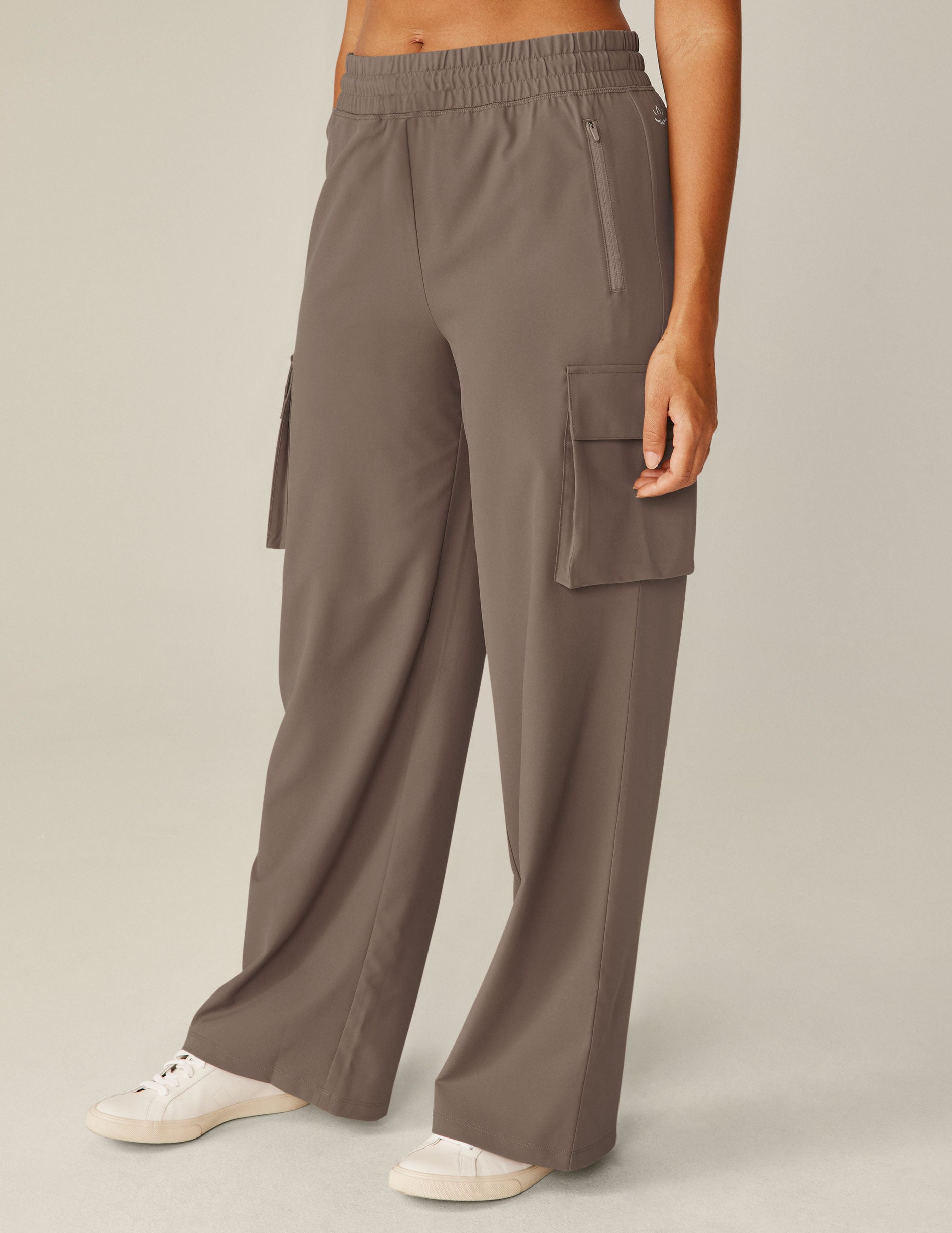 brown cargo style high-waisted pants with pockets. 