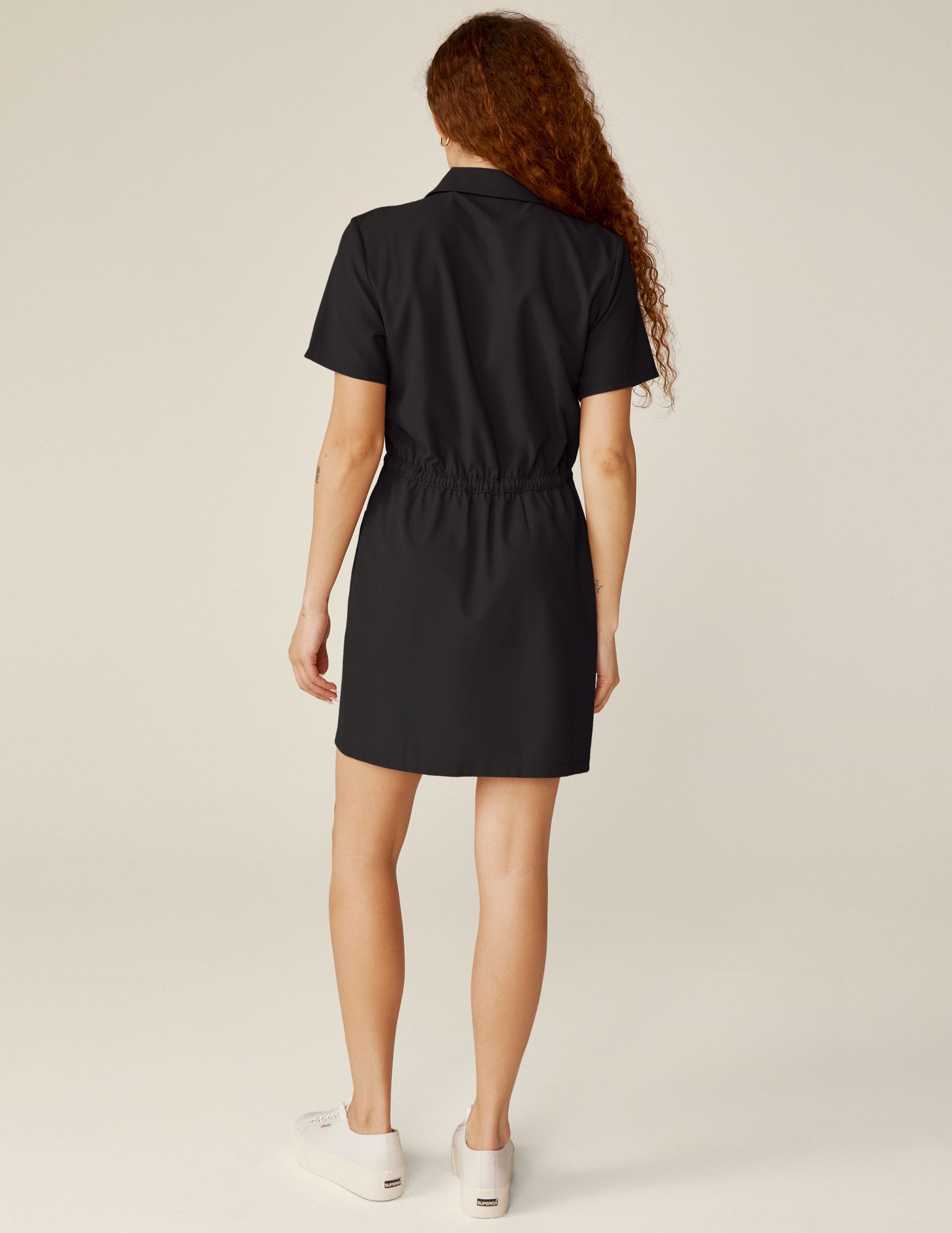 black zip-up mini cargo style dress. 