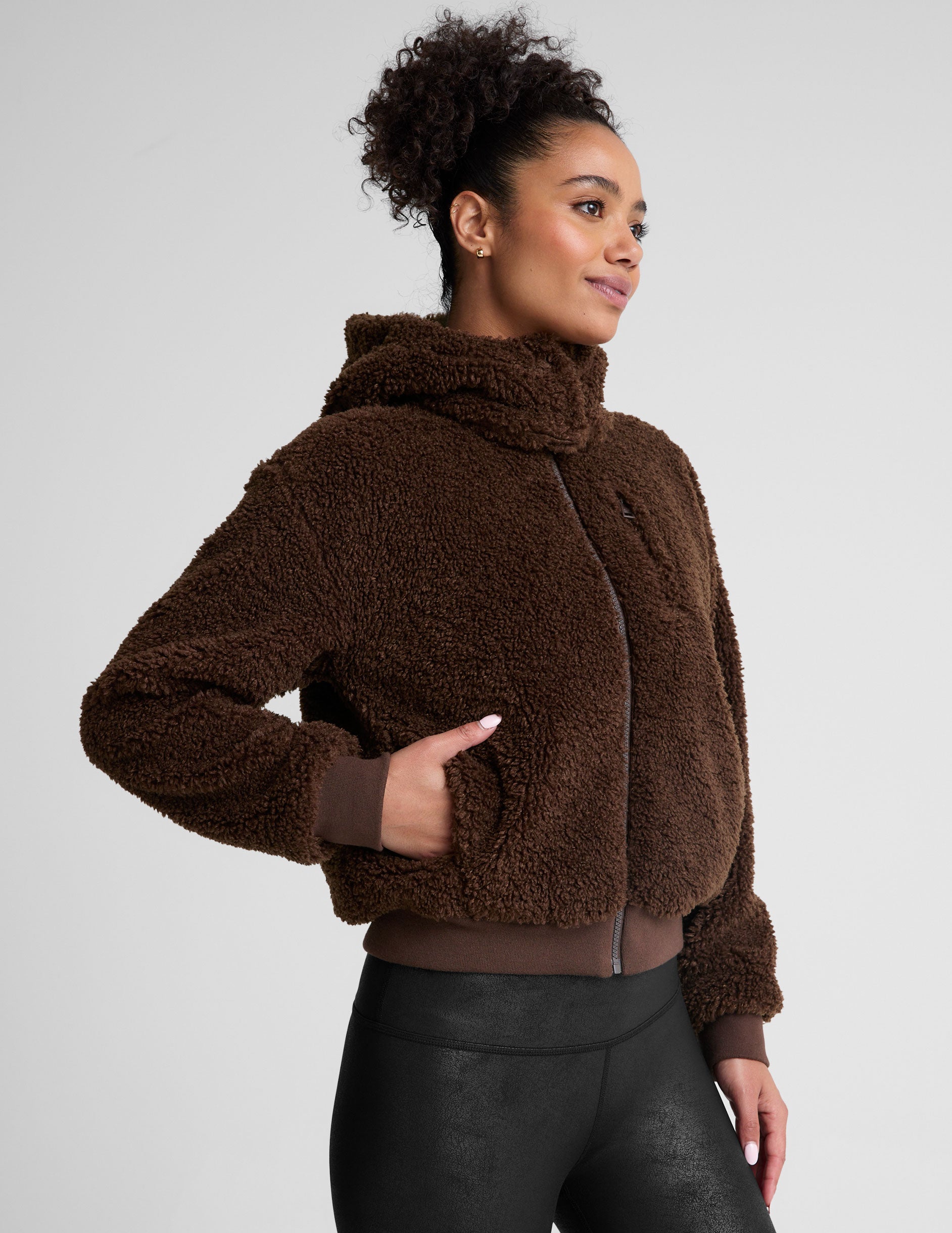 brown hooded faux sherpa jacket with pockets.