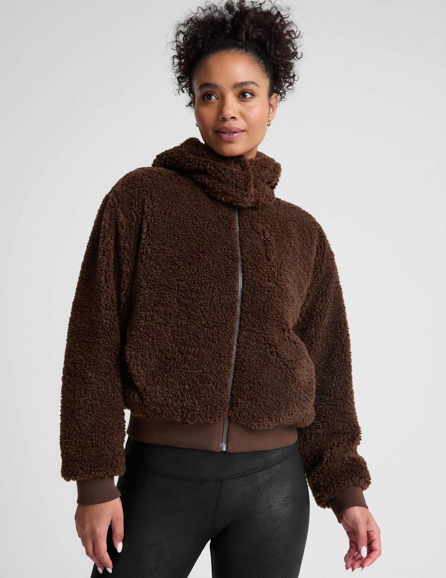 brown hooded faux sherpa jacket with pockets.
