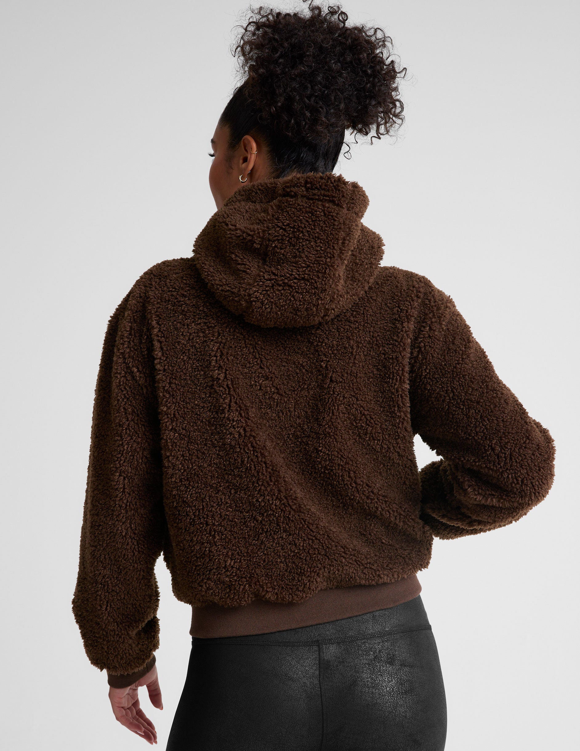 brown hooded faux sherpa jacket with pockets.