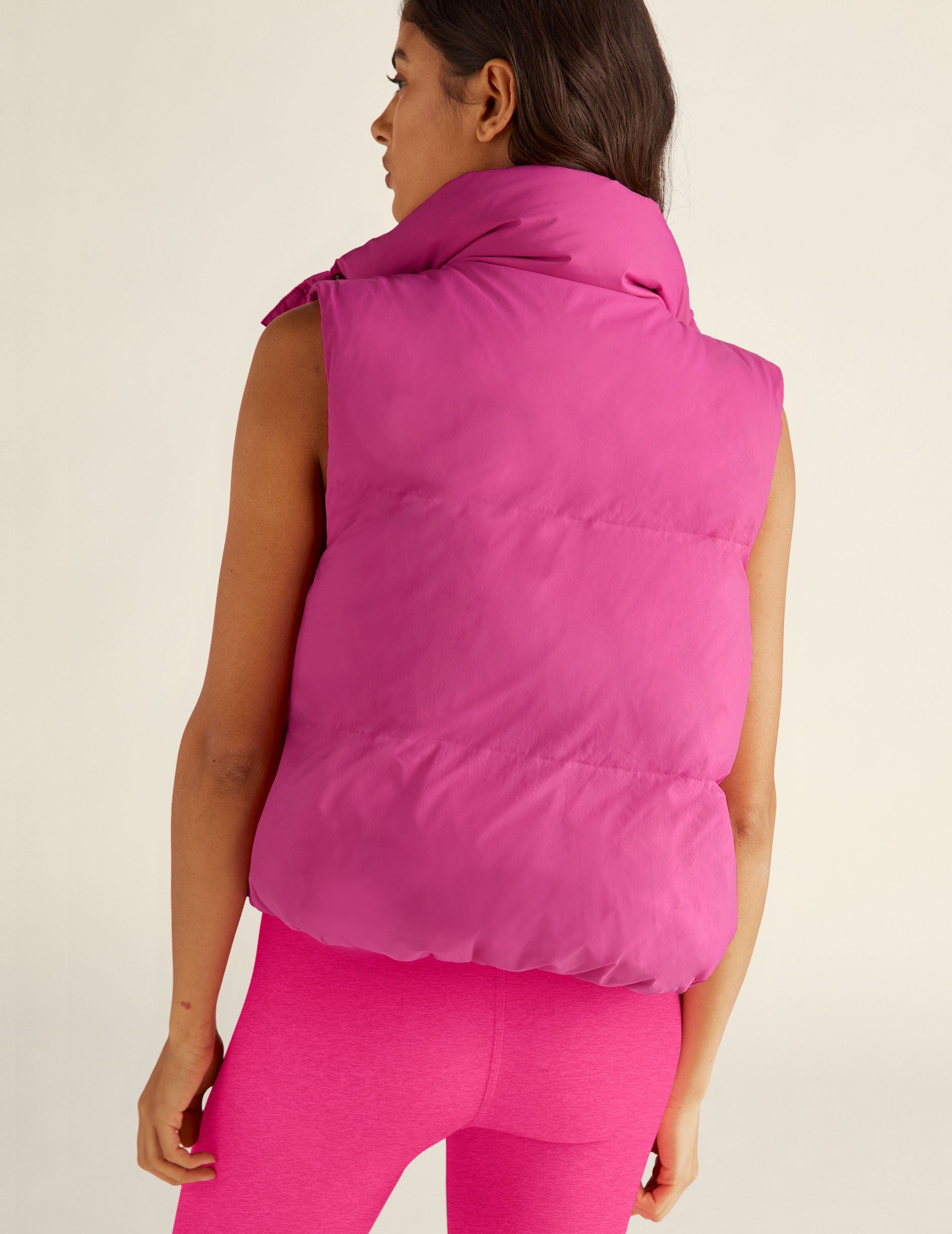 pink puffer vest. 