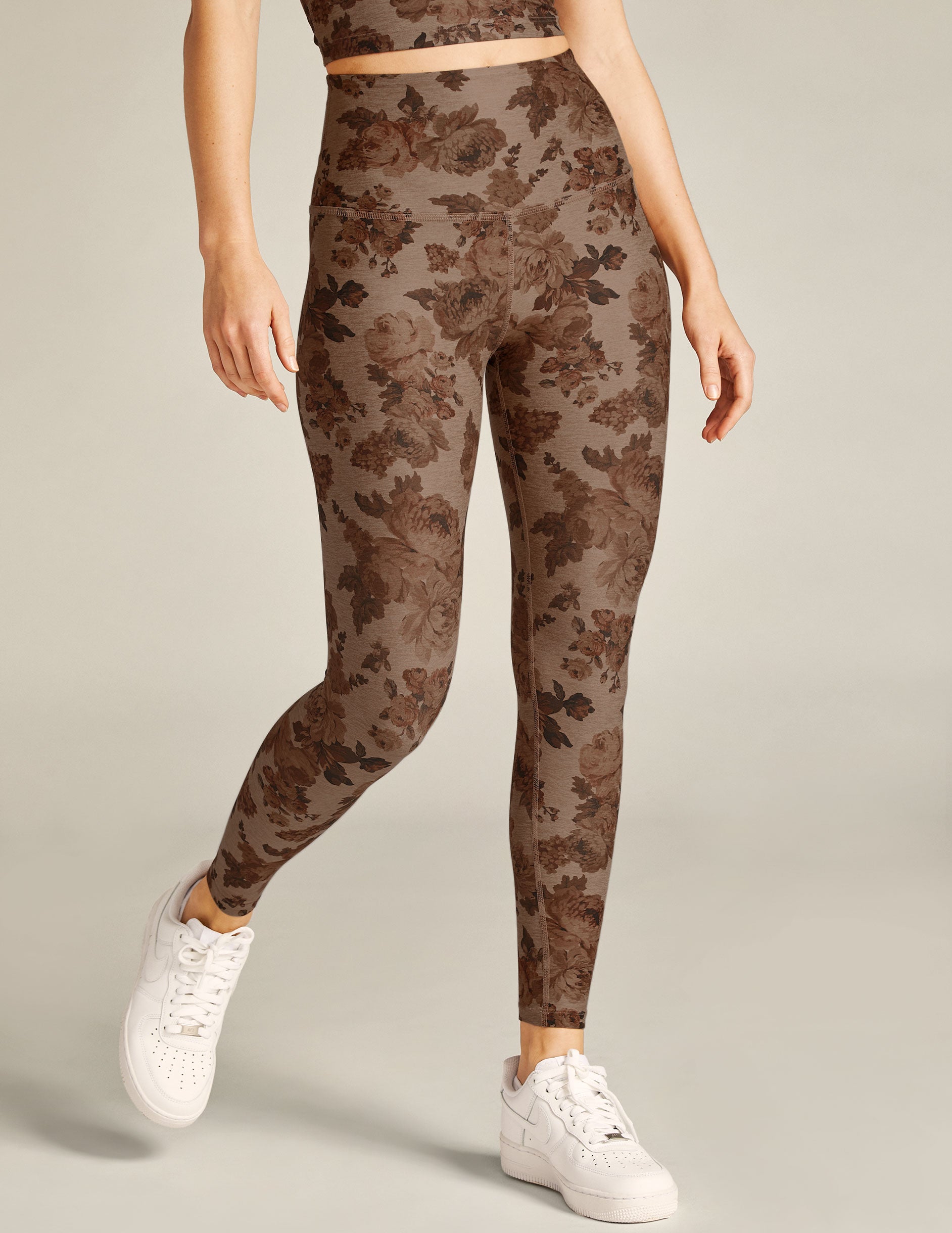 brown floral printed high-waisted midi leggings. 