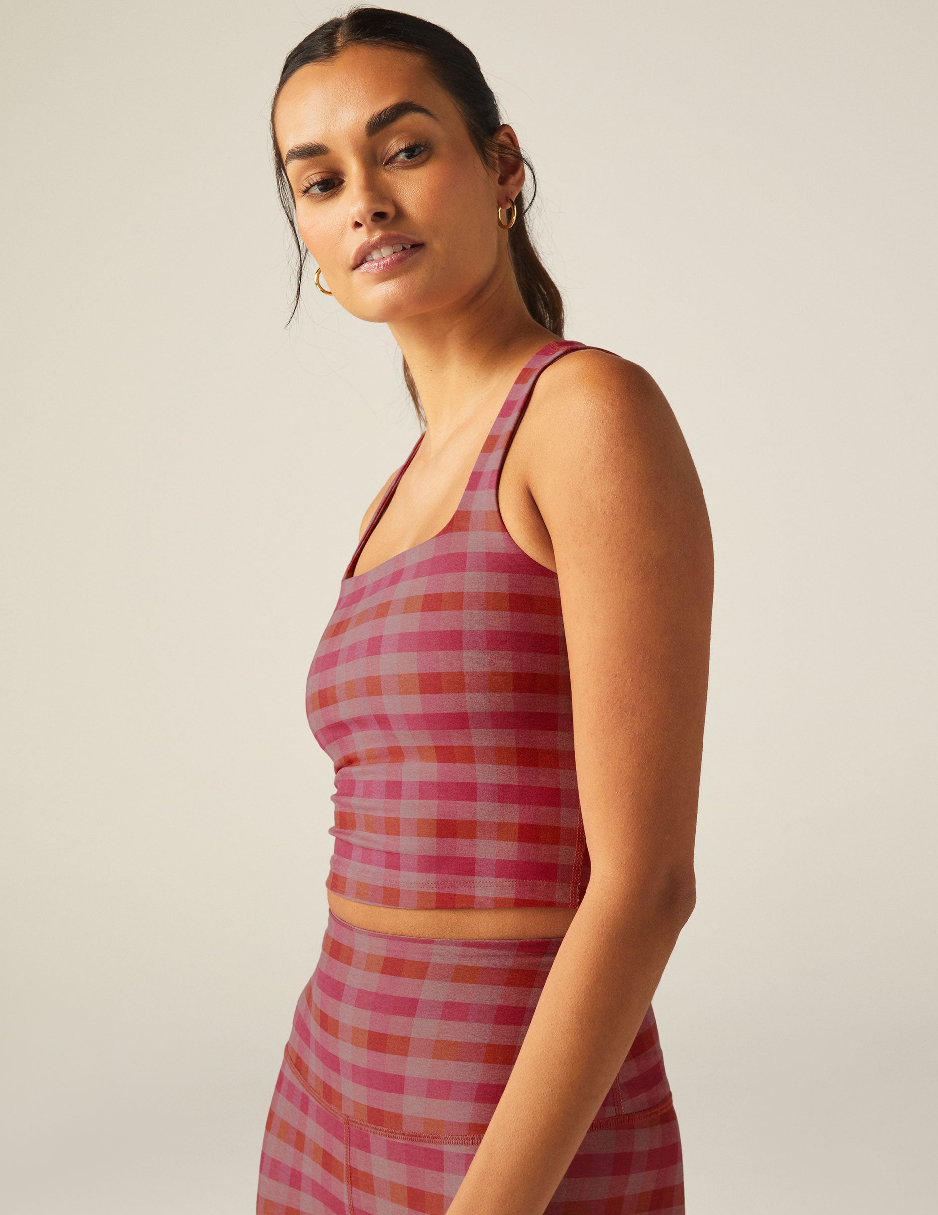pink gingham patterned square neck cropped tank top.