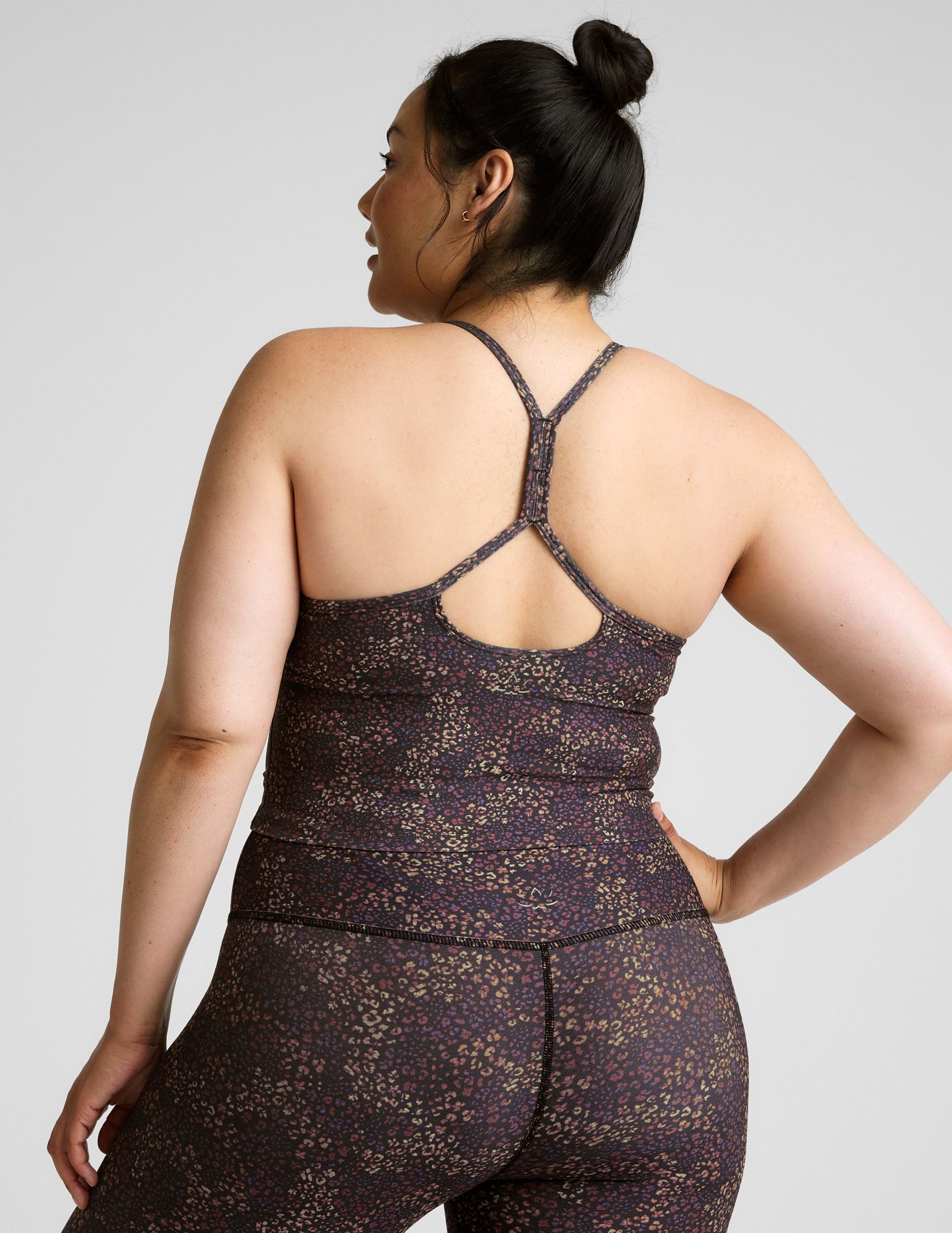 leopard printed racerback cropped tank top.