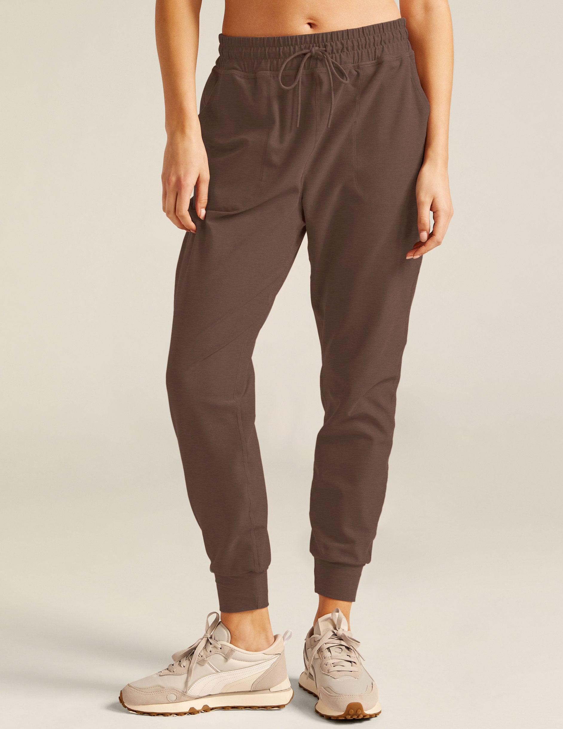 brown midi pocket joggers with an elastic waistband and drawstring. 