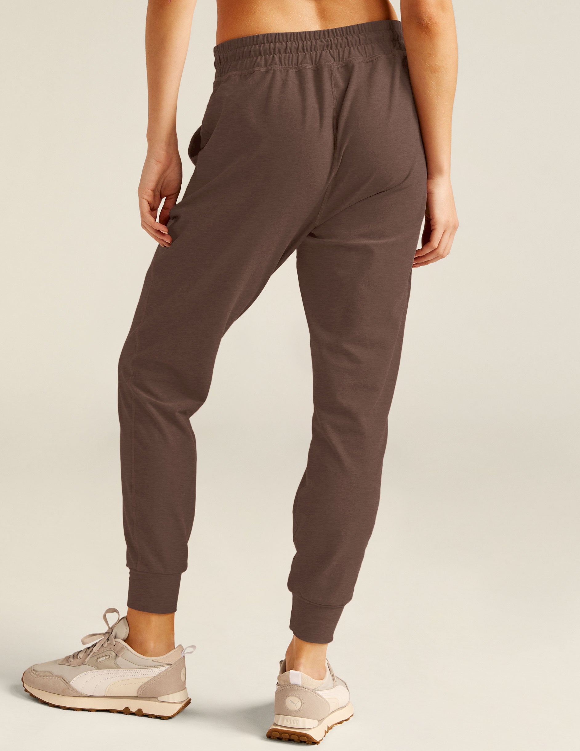 brown midi pocket joggers with an elastic waistband and drawstring. 