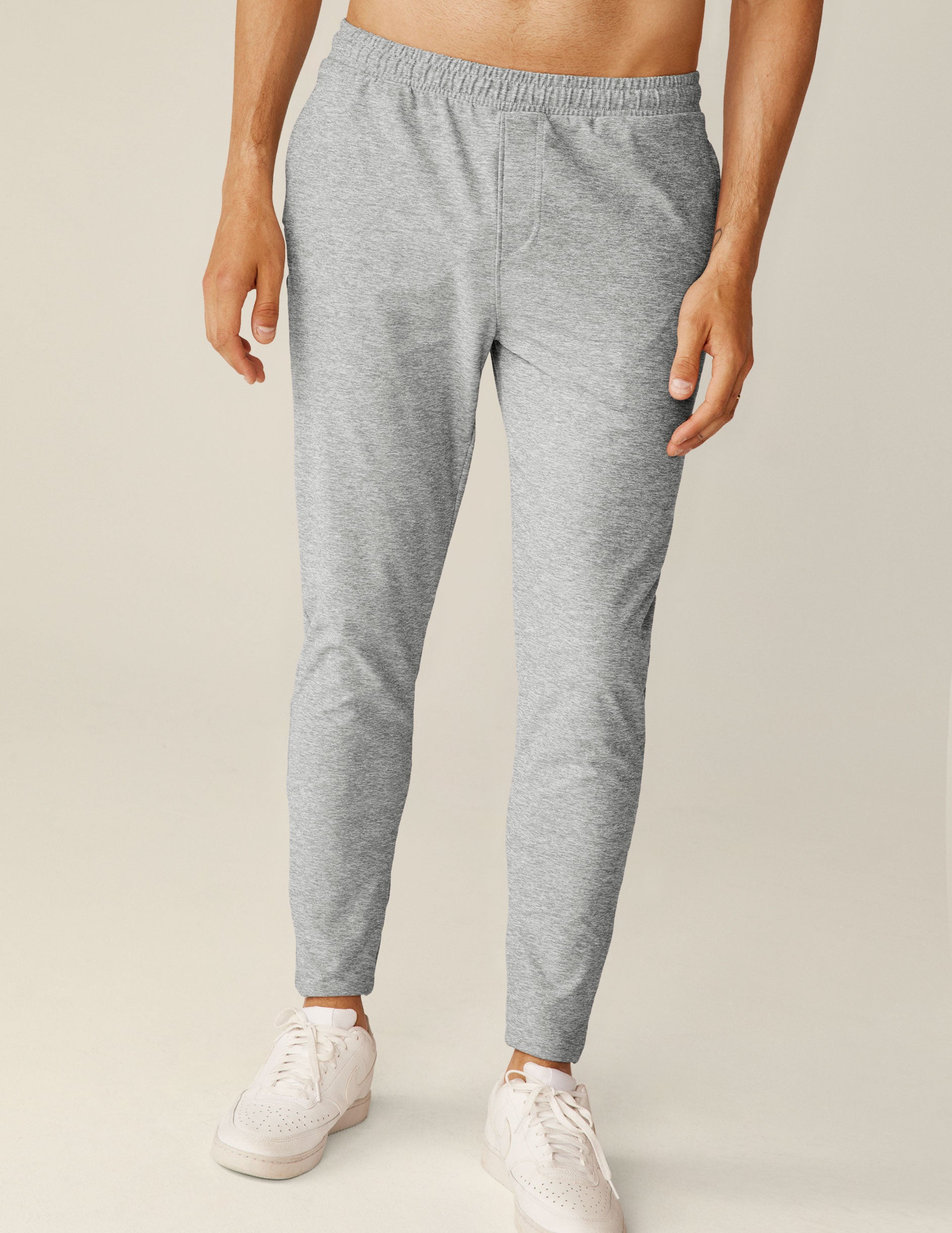 gray men's athleisure pants with an internal drawcord and pockets. 